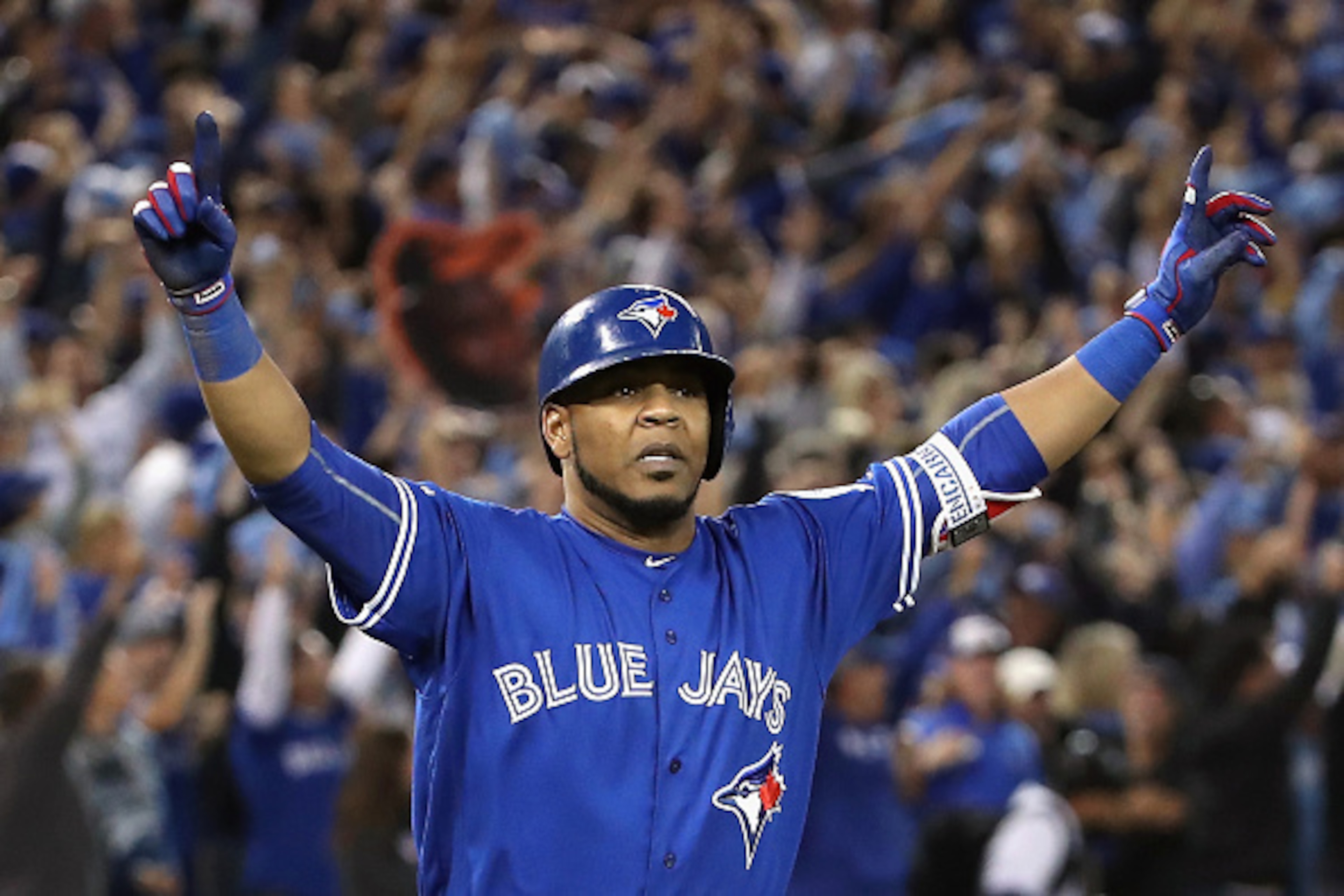 TORONTO, ON - OCTOBER 04:  Edwin Encarnacion #10 of the Toronto Blue Jays reacts after hitting a three-run walk-off home run in the eleventh inning to defeat the Baltimore Orioles 5-2 in the American League Wild Card game at Rogers Centre on October 4, 20
