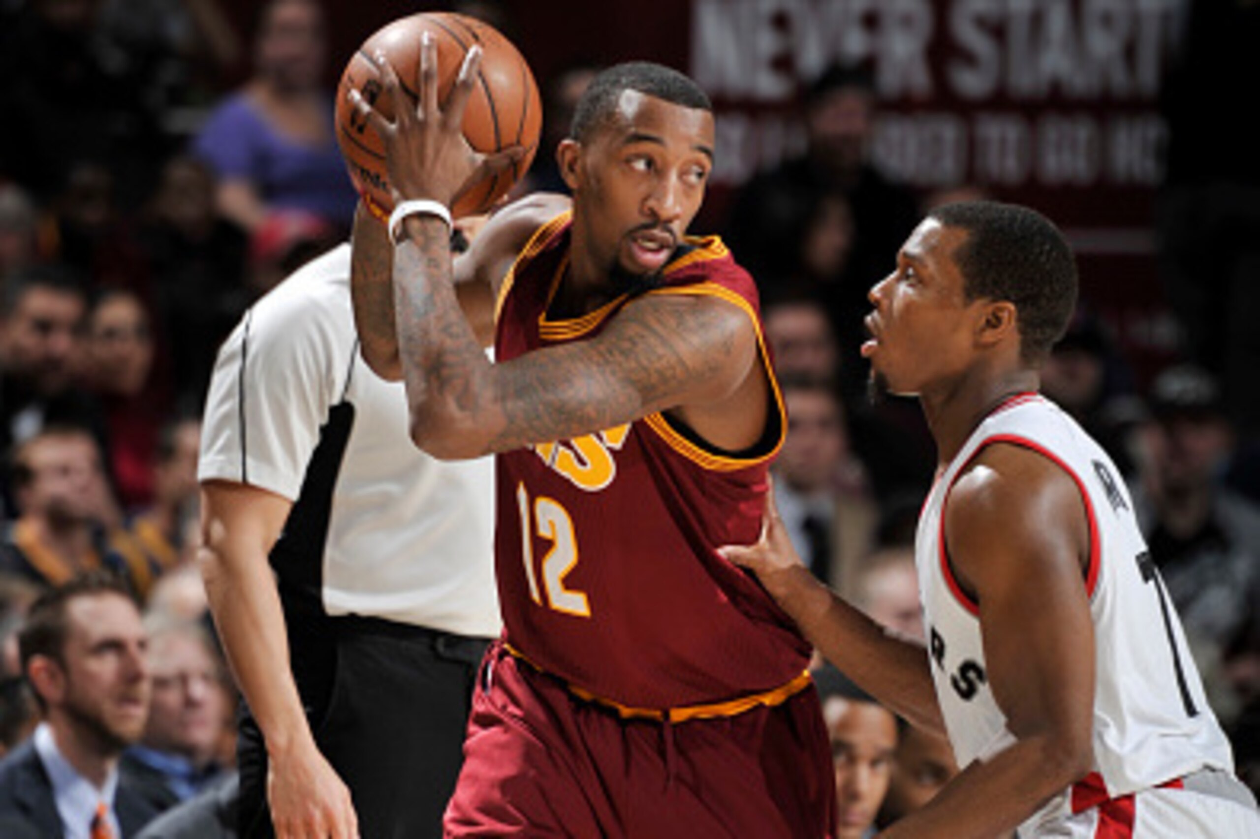 CLEVELAND, OH - NOVEMBER 15:  Jordan McRae #12 of the Cleveland Cavaliers handles the ball against Kyle Lowry #7 of the Toronto Raptors during a game on November 15, 2016 at Quicken Loans Arena in Cleveland, Ohio. NOTE TO USER: User expressly acknowledges