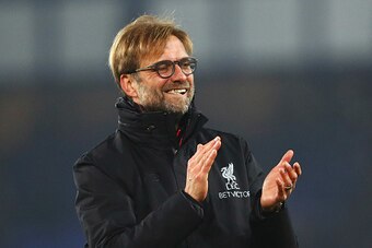 LIVERPOOL, ENGLAND - DECEMBER 19:  Jurgen Klopp manager of Liverpool celebrates victory after the Premier League match between Everton and Liverpool at Goodison Park on December 19, 2016 in Liverpool, England.  (Photo by Clive Brunskill/Getty Images)