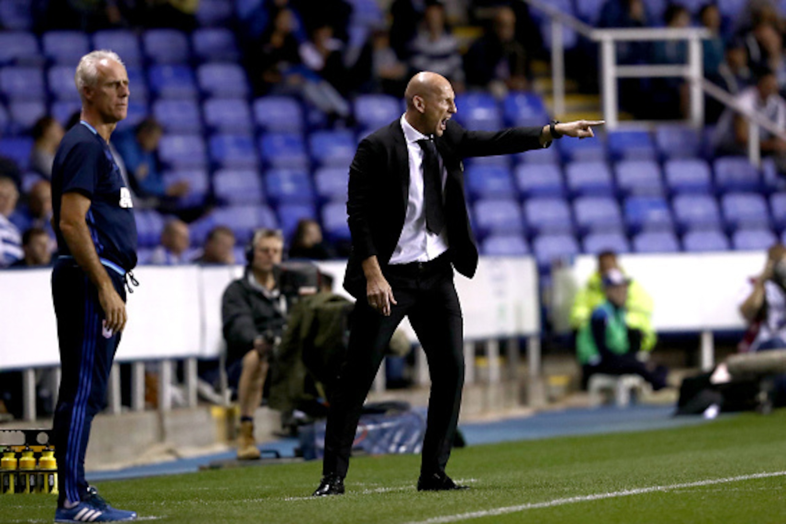 READING, ENGLAND - SEPTEMBER 09: Jaap Stam manager of Reading (r) and Mick McCarthy manager of Ipswich Town (l) during the Sky Bet Championship match between Reading and Ipswich Town at Madejski Stadium on September 9, 2016 in Reading, England. (Photo by 