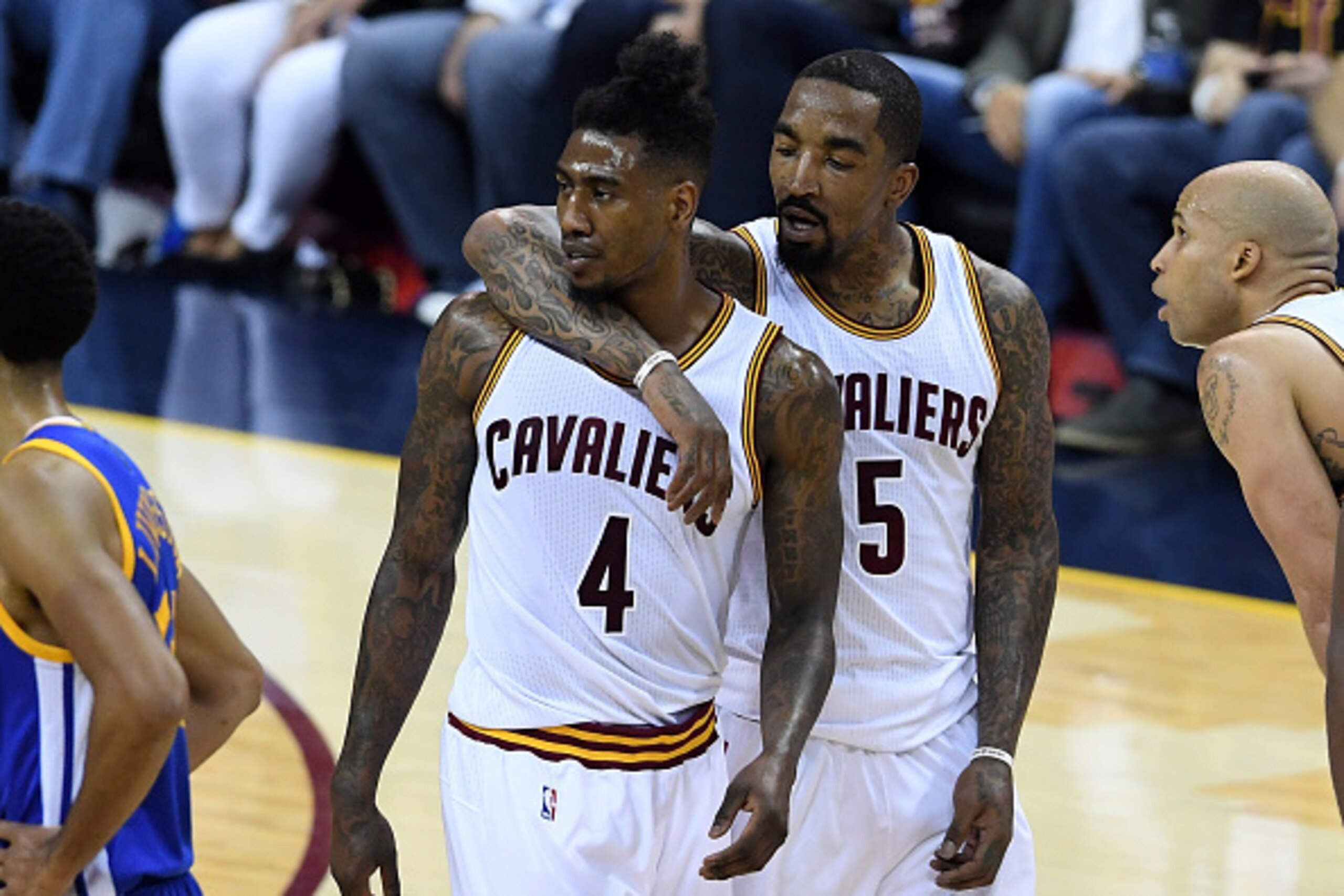 CLEVELAND, OH - JUNE 16: Iman Shumpert #4 and J.R. Smith #5 of the Cleveland Cavaliers react after a play in the first half against the Golden State Warriors in Game 6 of the 2016 NBA Finals at Quicken Loans Arena on June 16, 2016 in Cleveland, Ohio. NOTE