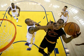 OAKLAND, CA - JUNE 19:  Andre Iguodala #9 of the Golden State Warriors defends LeBron James #23 of the Cleveland Cavaliers in Game 7 of the 2016 NBA Finals at ORACLE Arena on June 19, 2016 in Oakland, California. NOTE TO USER: User expressly acknowledges