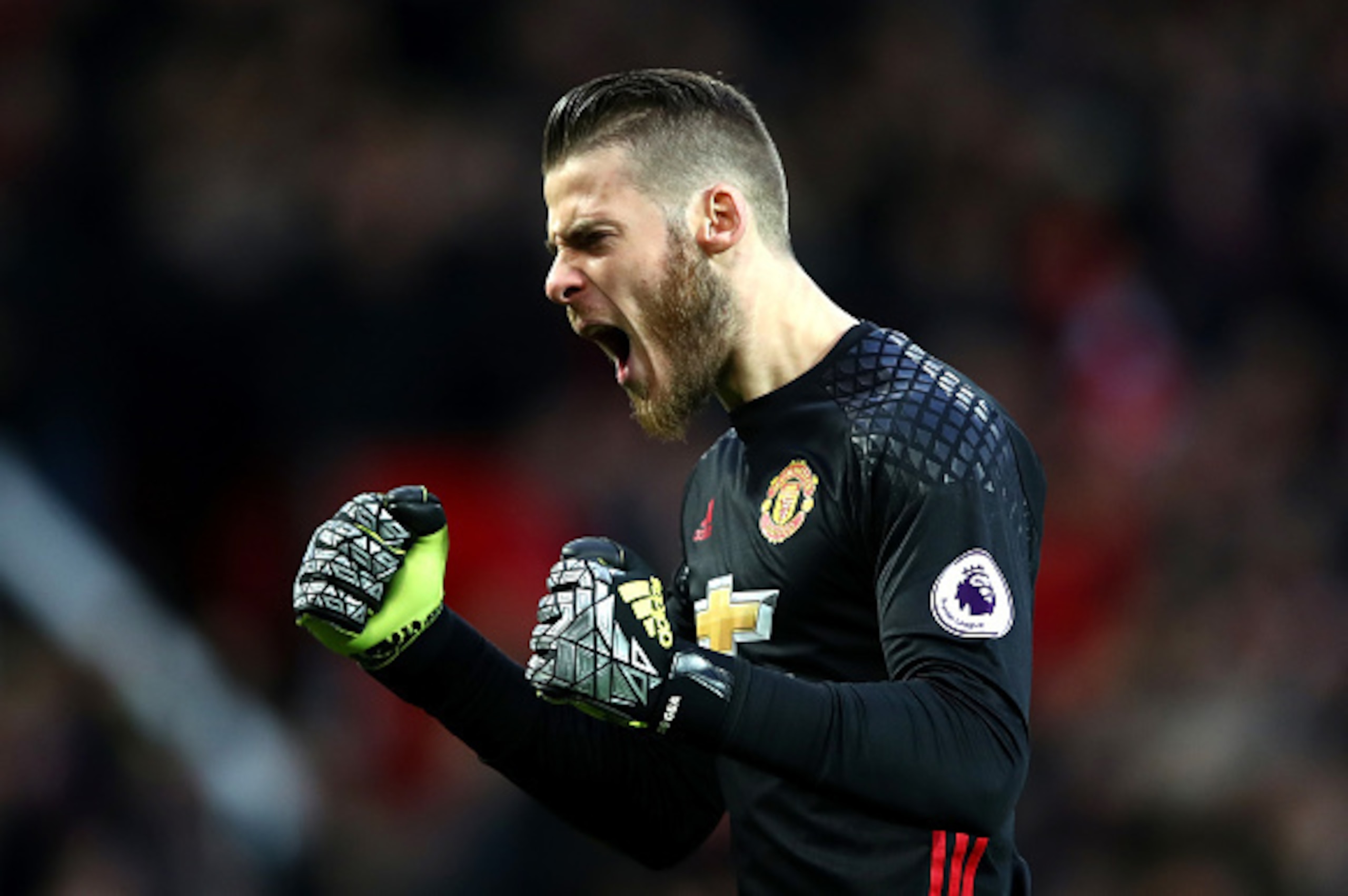 MANCHESTER, ENGLAND - DECEMBER 11:  David De Gea of Manchester United celebrates his team's first goal during the Premier League match between Manchester United and Tottenham Hotspur at Old Trafford on December 11, 2016 in Manchester, England.  (Photo by 