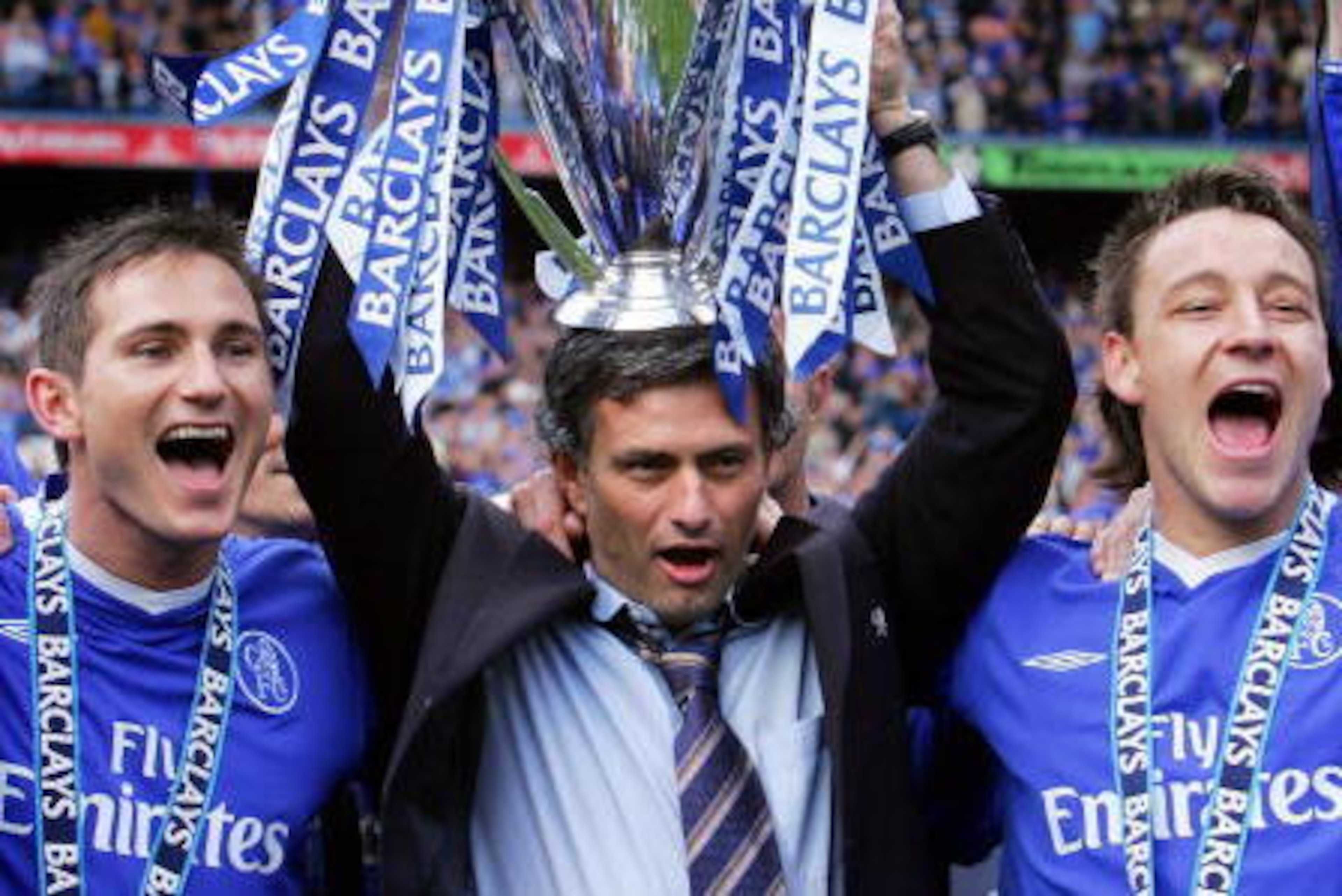 (FILES) Chelsea's Manager Jose Mourinho (C) holds aloft the Barclays Premiership trophy beside Frank Lampard (L) and John Terry (R) during the celebrations after the game against Charlton at Stamford Bridge in London, 07 May 2005. Jose Mourinho's three-ye (FILES) Chelsea's Manager Jose Mourinho (C) holds aloft the Barclays Premiership trophy beside Frank Lampard (L) and John Terry (R) during the celebrations after the game against Charlton at Stamford Bridge in London, 07 May 2005. Jose Mourinho's three-ye