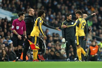 MANCHESTER, ENGLAND - DECEMBER 18: Substitute, Alex Oxlade-Chamberlain of is taken off and replaced during the Premier League match between Manchester City and Arsenal at Etihad Stadium on December 18, 2016 in Manchester, England. (Photo by James Baylis -