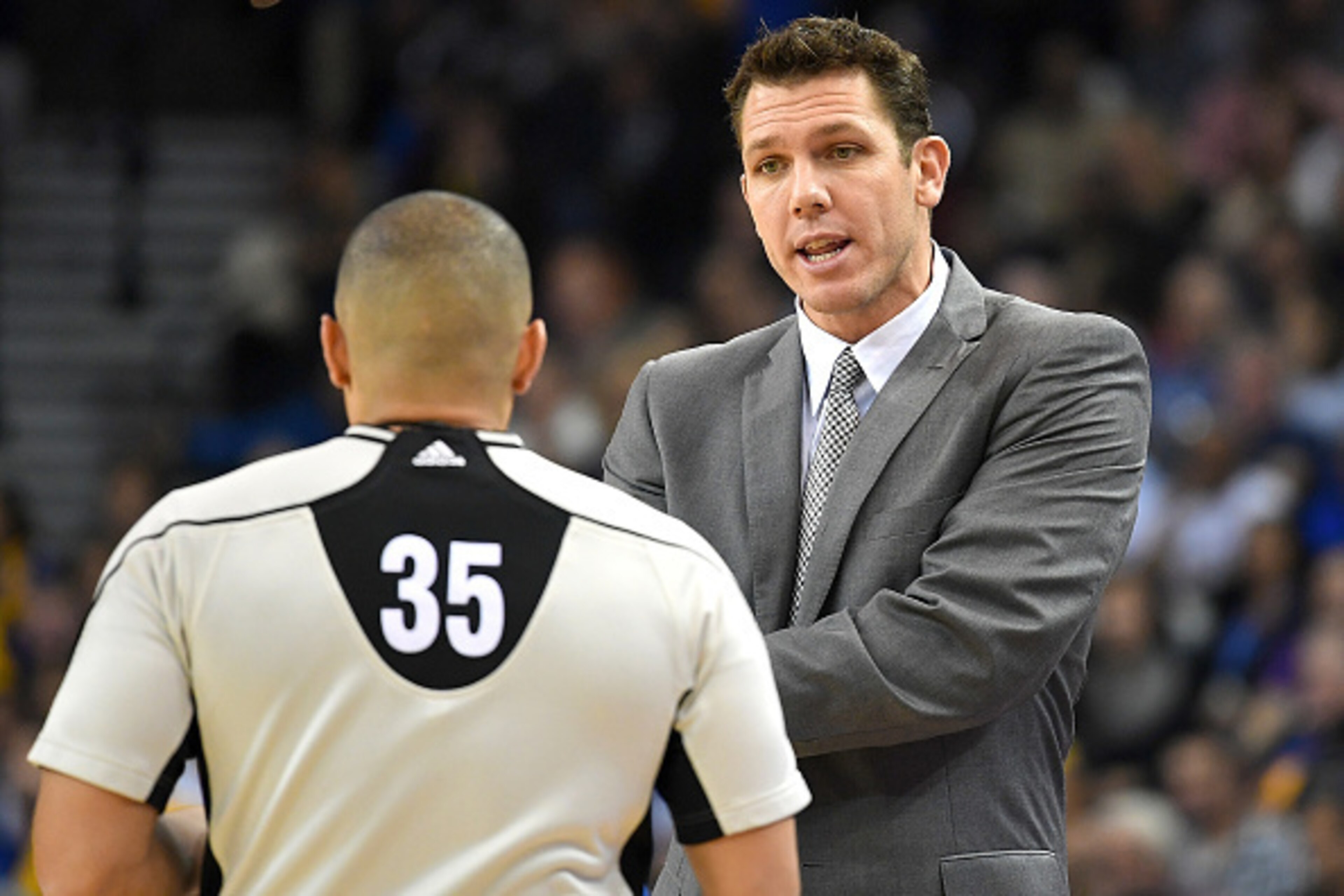OAKLAND, CA - NOVEMBER 23:  Head coach Luke Walton of the Los Angeles Lakers complains over a call to referee Steve Anderson #35 during an NBA basketball game against the Golden State Warriors at ORACLE Arena on November 23, 2016 in Oakland, California. N