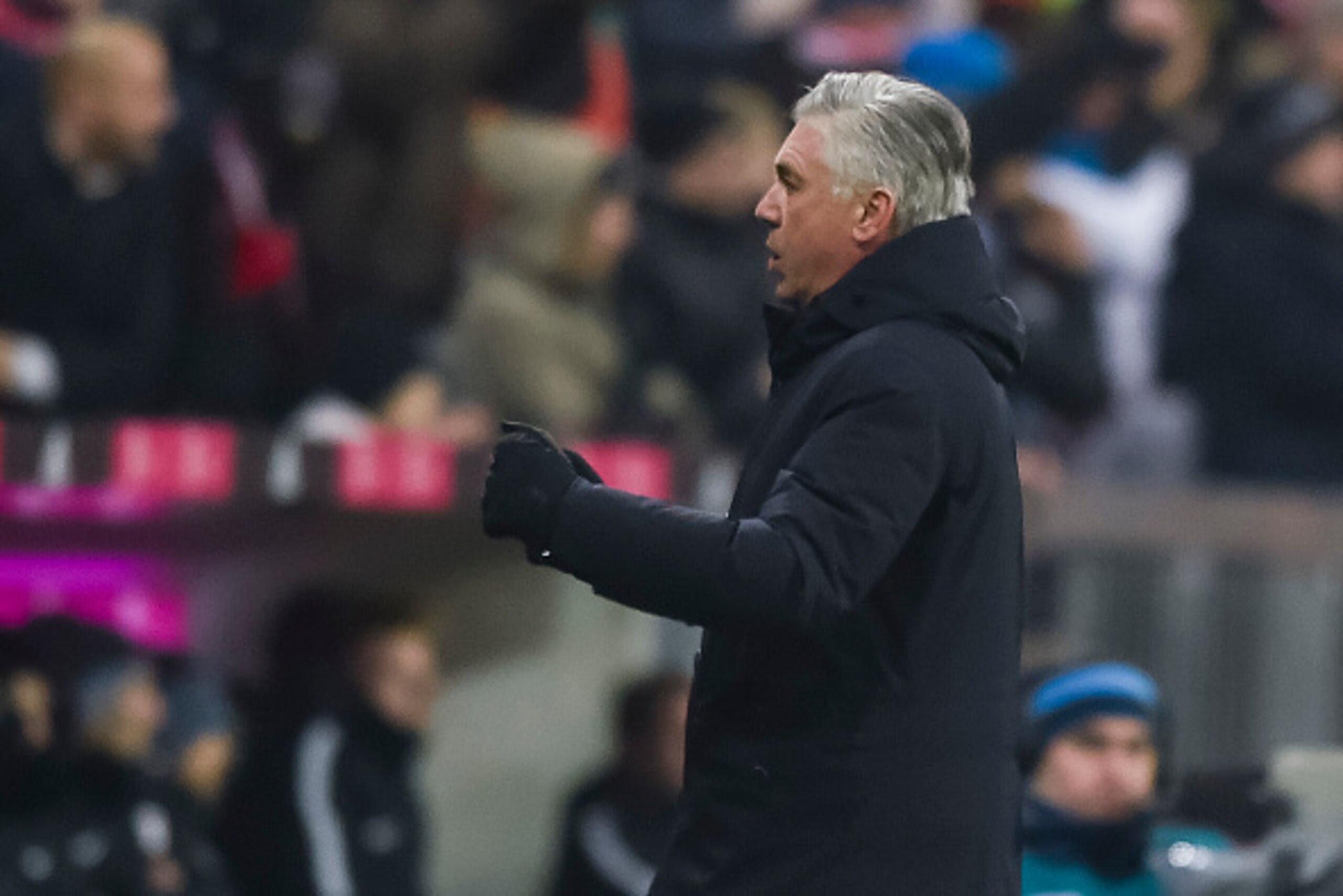 Bayern Munich's Italian head coach Carlo Ancelotti celebrates the second goal for his team during the German first division Bundesliga football match FC Bayern Munich vs RB Leipzig in Munich, Germany, on December 21, 2016. / AFP / GUENTER SCHIFFMANN / RES