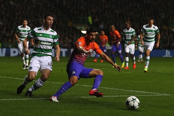 GLASGOW, SCOTLAND - SEPTEMBER 28:  Nolito of Manchester City tracked by Kieran Tierney of Celtic during the UEFA Champions League match between Celtic and Manchester City at Celtic Park on September 28, 2016 in Glasgow, Scotland.  (Photo by Michael Steele