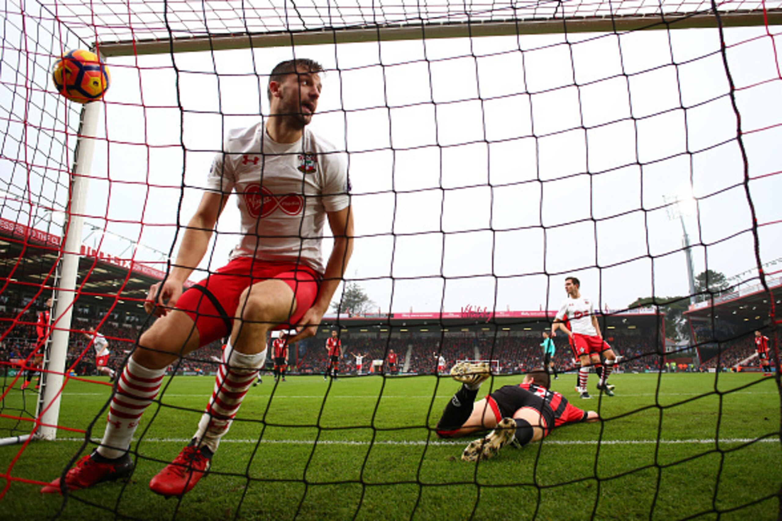 BOURNEMOUTH, ENGLAND - DECEMBER 18: Jay Rodriguez of Southampton (L) celebrates scoring his sides second goal during the Premier League match between AFC Bournemouth and Southampton at Vitality Stadium on December 18, 2016 in Bournemouth, England.  (Photo