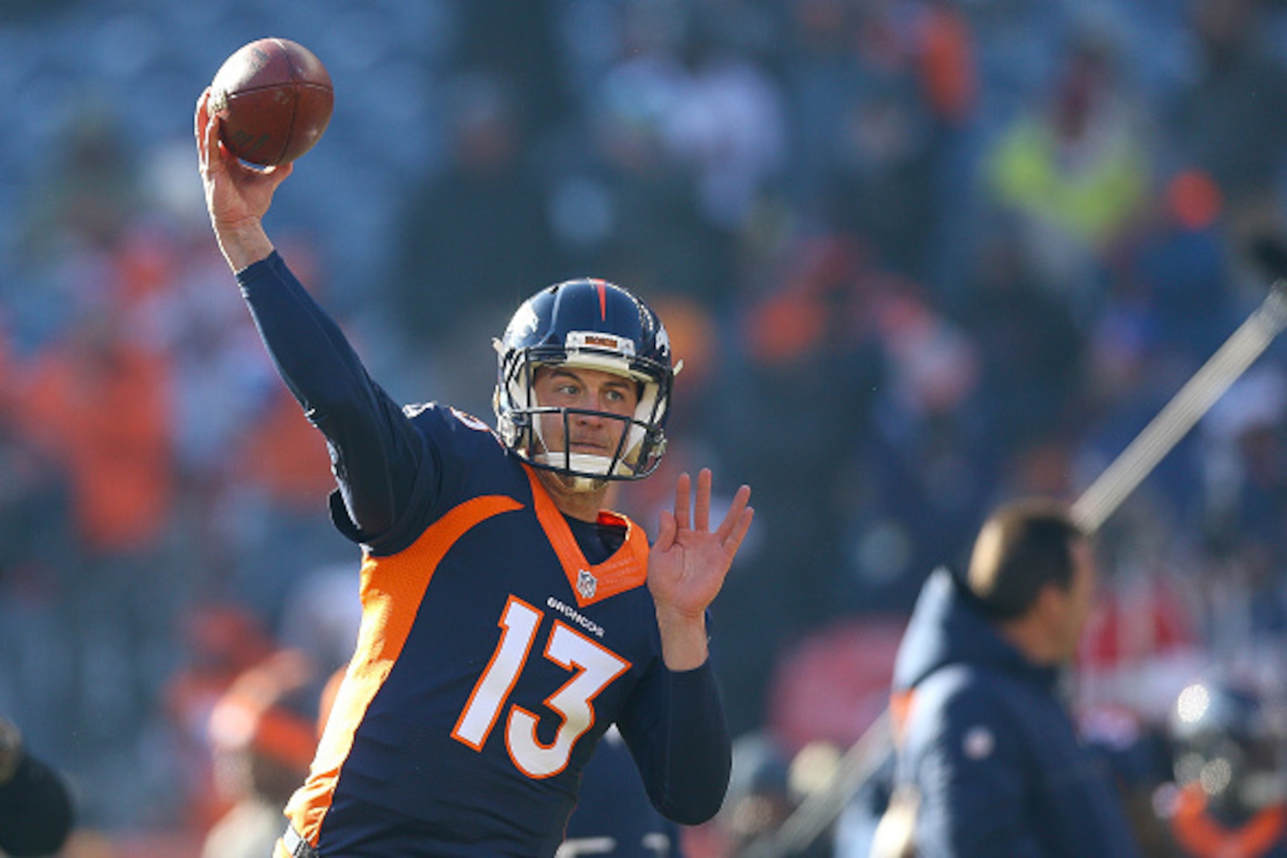 DENVER, CO - DECEMBER 18: Quarterback Trevor Siemian #13 of the Denver Broncos throws as he warms up before a game against the New England Patriots at Sports Authority Field at Mile High on December 18, 2016 in Denver, Colorado. (Photo by Justin Edmonds/ DENVER, CO - DECEMBER 18: Quarterback Trevor Siemian #13 of the Denver Broncos throws as he warms up before a game against the New England Patriots at Sports Authority Field at Mile High on December 18, 2016 in Denver, Colorado. (Photo by Justin Edmonds/