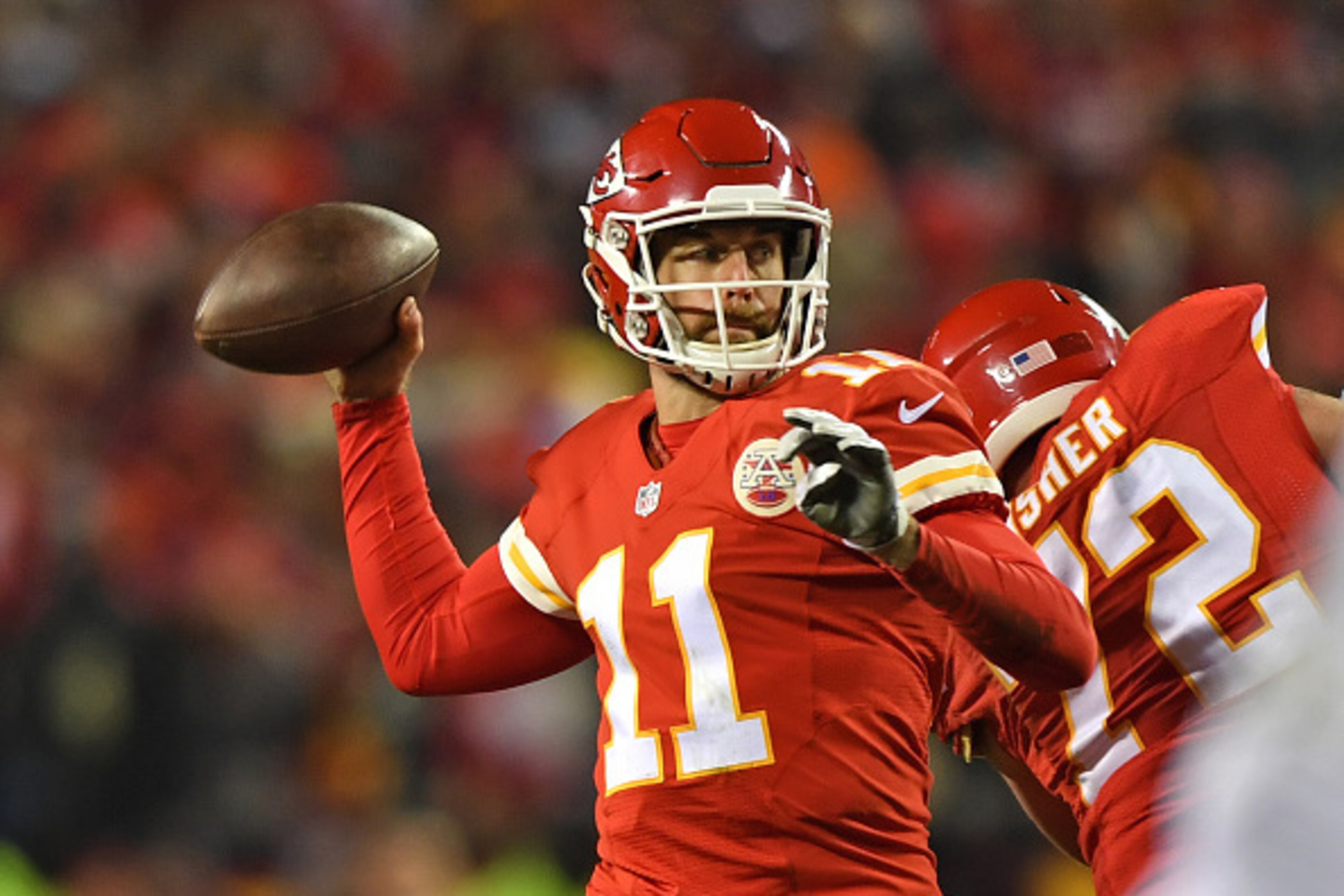 KANSAS CITY, MO - DECEMBER 08:  Quarterback Alex Smith #11 of the Kansas City Chiefs throws a pass against the Oakland Raiders during the first half on December 8, 2016 at Arrowhead Stadium in Kansas City, Missouri.  (Photo by Peter G. Aiken/Getty Images)
