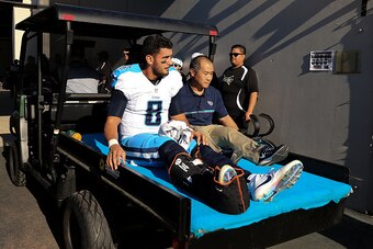 JACKSONVILLE, FL - DECEMBER 24: Marcus Mariota #8 of the Tennessee Titans is carted off the field after fracturing his fibula during the second half of the game against the Jacksonville Jaguars at EverBank Field on December 24, 2016 in Jacksonville, Flori