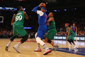 NEW YORK, NY - DECEMBER 25:  Jae Crowder #99 of the Boston Celtics defends against Carmelo Anthony #7 of the New York Knicksat Madison Square Garden on December 25, 2016 in New York City. NOTE TO USER: User expressly acknowledges and agrees that, by downl