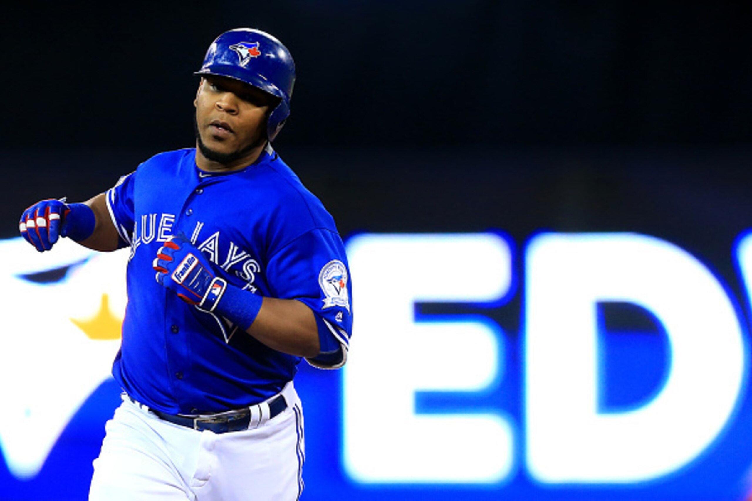 TORONTO, ON - OCTOBER 9: Edwin Encarnacion #10 of the Toronto Blue Jays runs the bases after hitting a two run home run in the first inning against the Texas Rangers during game three of the American League Division Series at Rogers Centre on October 9, 2
