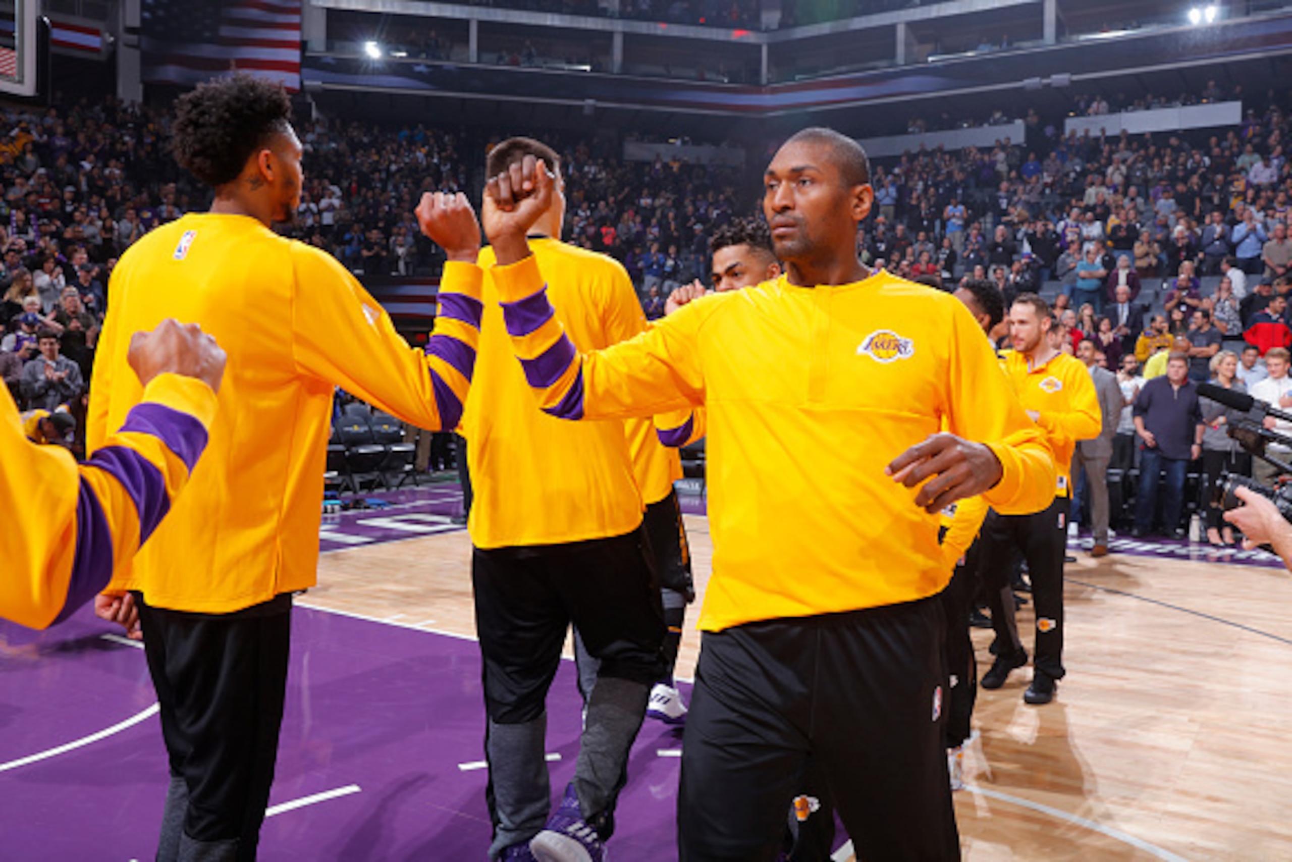 SACRAMENTO, CA - DECEMBER 12: Metta World Peace #37 of the Los Angeles Lakers high fives teammates prior to the game against the Sacramento Kings on December 12, 2016 at Golden 1 Center in Sacramento, California. NOTE TO USER: User expressly acknowledges 