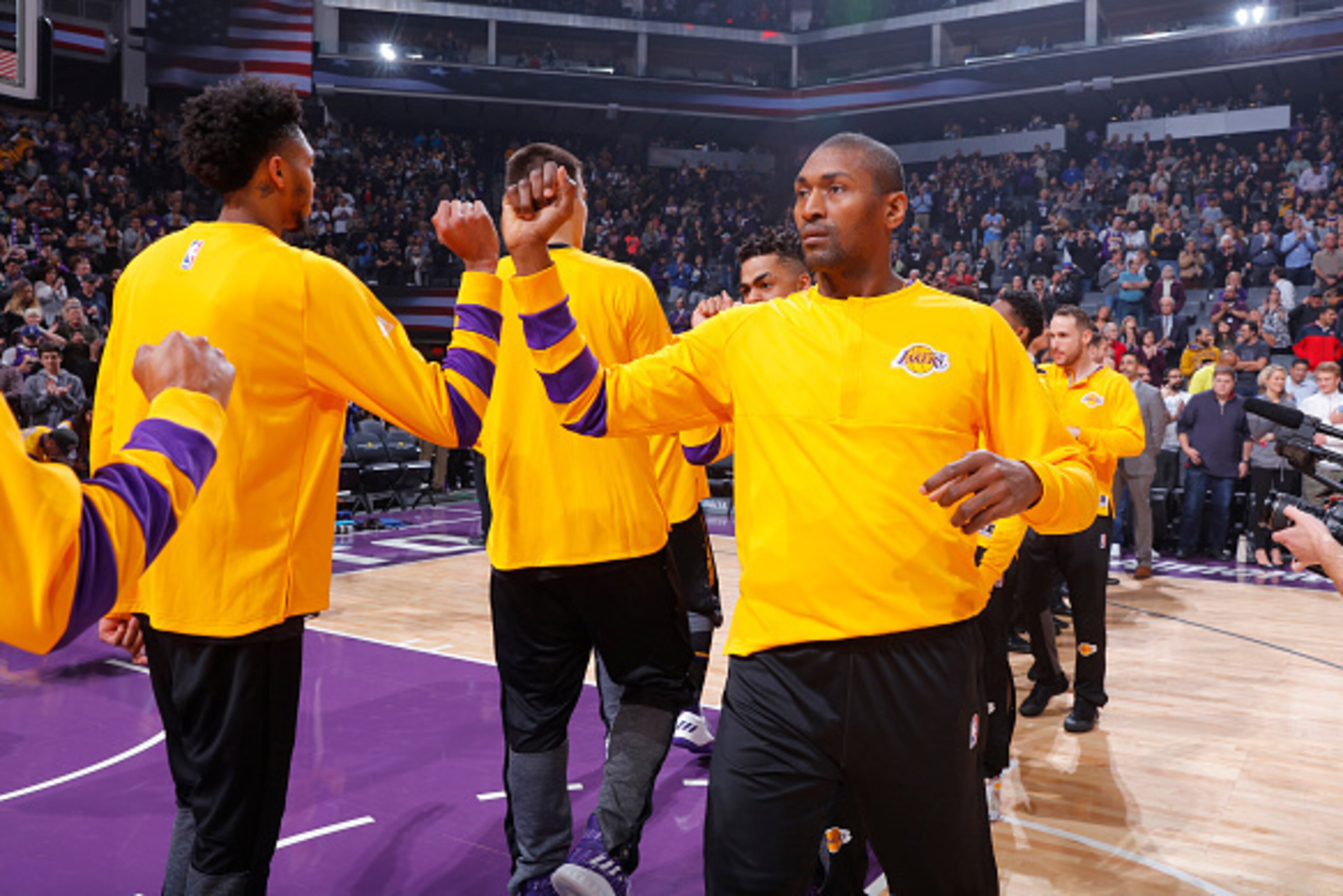SACRAMENTO, CA - DECEMBER 12: Metta World Peace #37 of the Los Angeles Lakers high fives teammates prior to the game against the Sacramento Kings on December 12, 2016 at Golden 1 Center in Sacramento, California. NOTE TO USER: User expressly acknowledges SACRAMENTO, CA - DECEMBER 12: Metta World Peace #37 of the Los Angeles Lakers high fives teammates prior to the game against the Sacramento Kings on December 12, 2016 at Golden 1 Center in Sacramento, California. NOTE TO USER: User expressly acknowledges