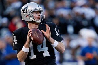 OAKLAND, CA - DECEMBER 24:  Matt McGloin #14 of the Oakland Raiders looks to pass against the Indianapolis Colts during their NFL game at Oakland Alameda Coliseum on December 24, 2016 in Oakland, California.  (Photo by Brian Bahr/Getty Images)