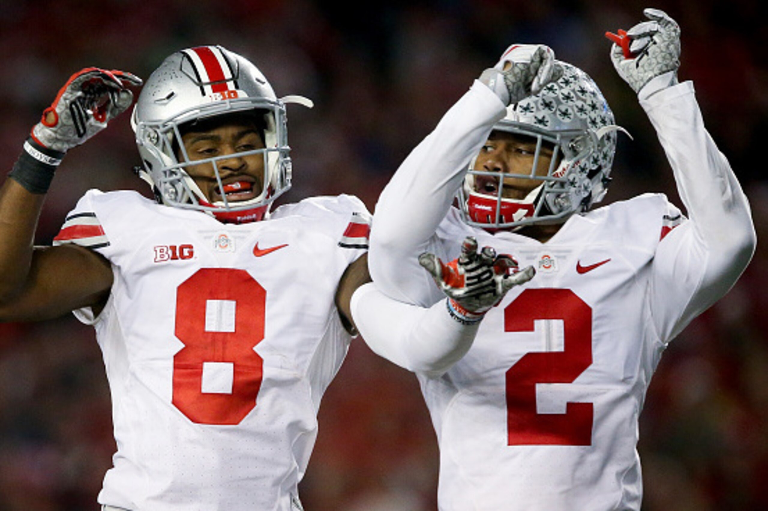 MADISON, WI - OCTOBER 15:  Gareon Conley #8 and Marshon Lattimore #2 of the Ohio State Buckeyes celebrate after Conley made an interception in the third quarter against the Wisconsin Badgers at Camp Randall Stadium on October 15, 2016 in Madison, Wisconsi
