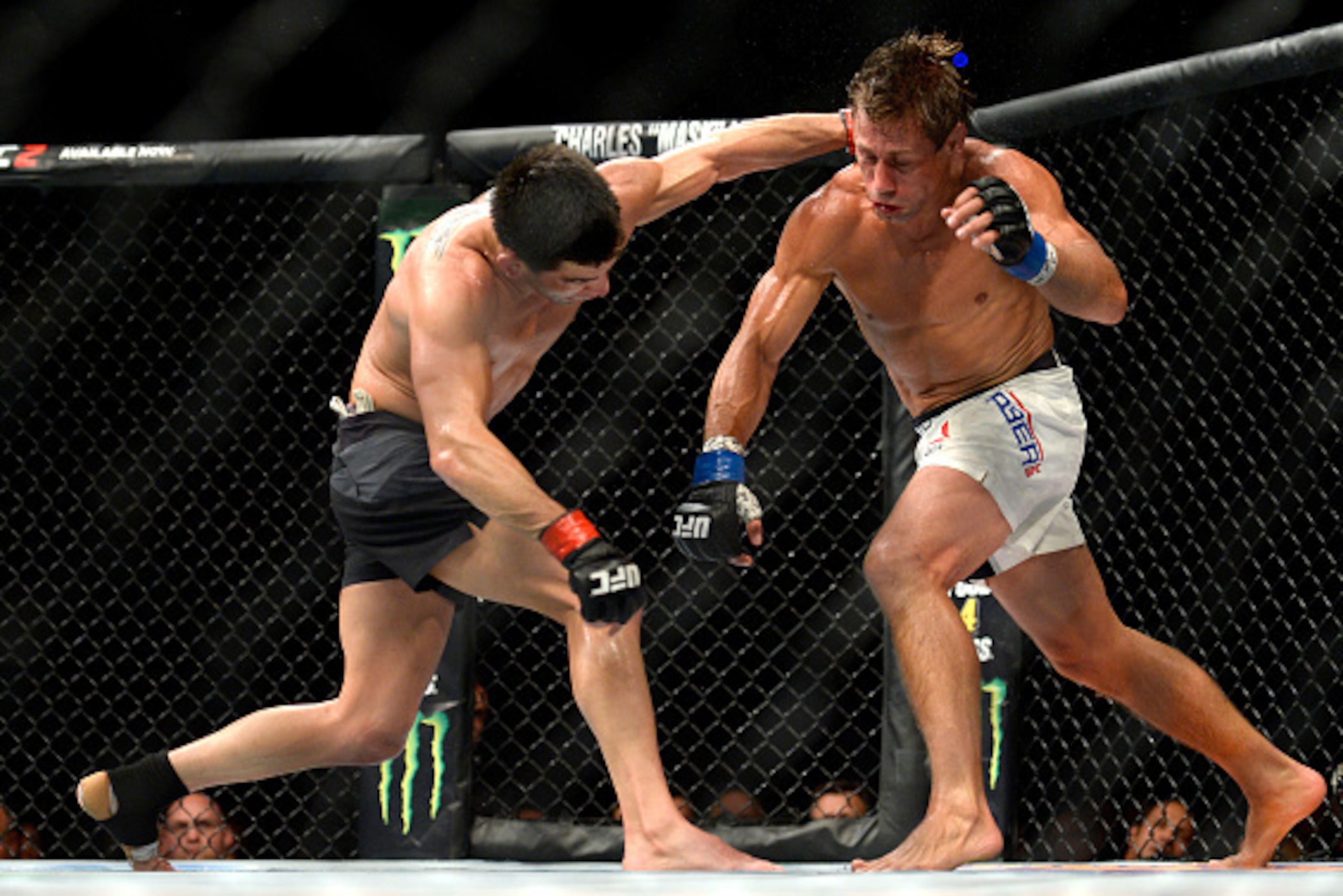 INGLEWOOD, CA - JUNE 04: Dominick Cruz throws a left punch at Urijah Faber during the UFC 199 event at The Forum on June 4, 2016 in Inglewood, California.  (Photo by Brandon Magnus/Zuffa LLC/Zuffa LLC via Getty Images)