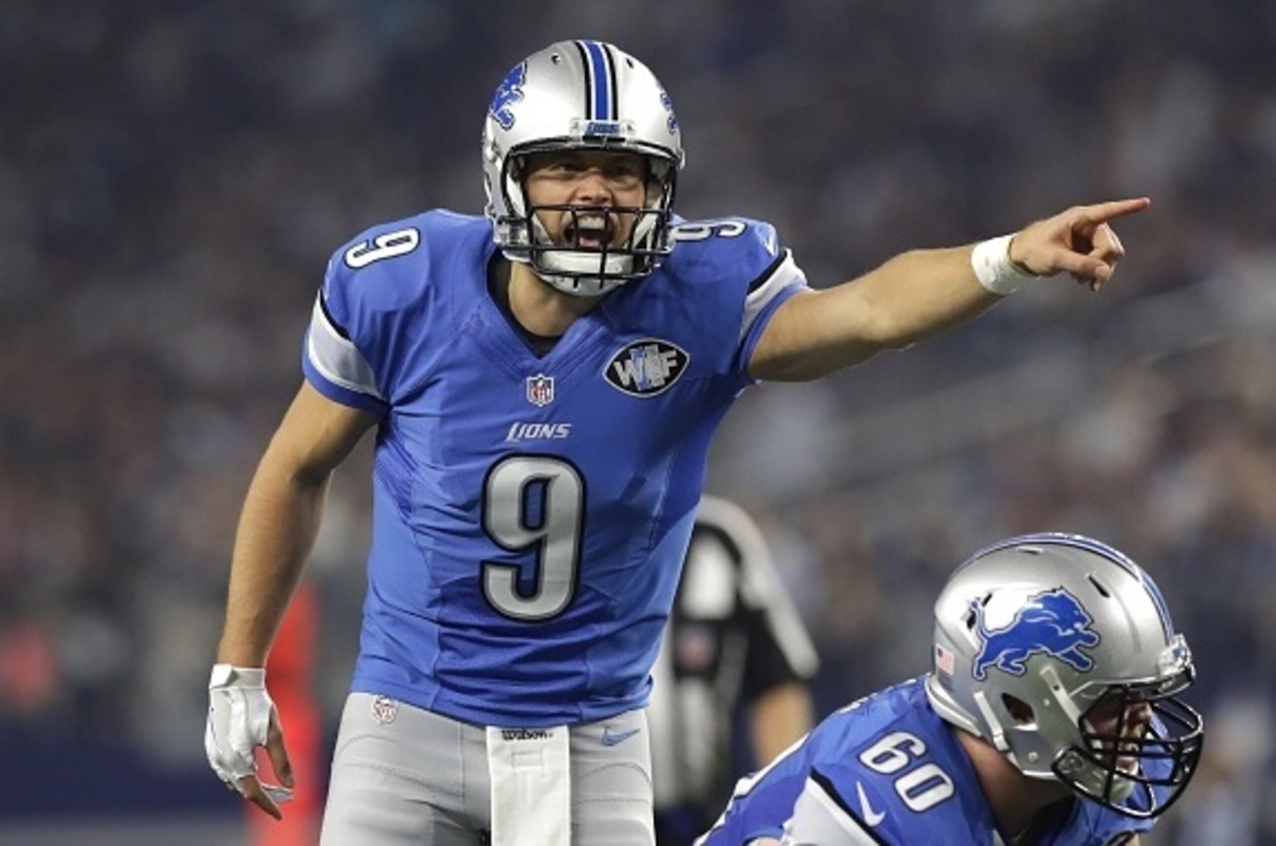 ARLINGTON, TX - DECEMBER 26: Matthew Stafford #9 of the Detroit Lions calla play against the Dallas Cowboys during the first half at AT&T Stadium on December 26, 2016 in Arlington, Texas. (Photo by Ronald Martinez/Getty Images)