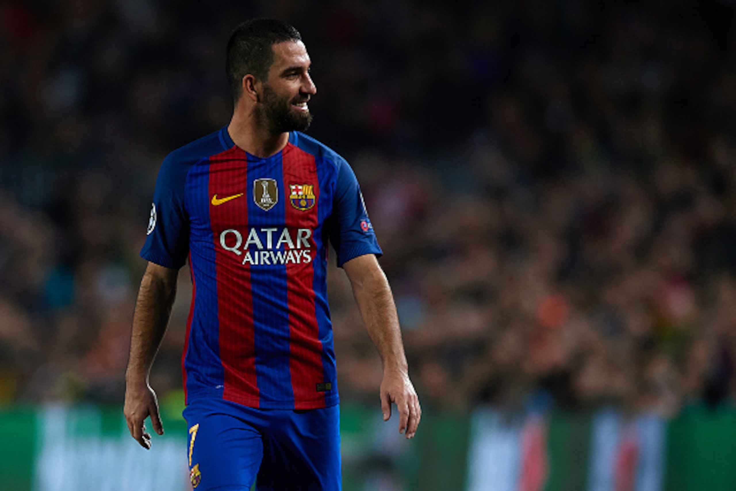 BARCELONA, SPAIN - DECEMBER 06:  Arda Turan of Barcelona reacts during the UEFA Champions League Group C match between FC Barcelona and VfL Borussia Moenchengladbach at Camp Nou on December 6, 2016 in Barcelona.  (Photo by Manuel Queimadelos Alonso/Getty 