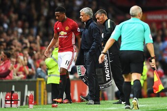 MANCHESTER, ENGLAND - AUGUST 19:  Anthony Martial of Manchester United is substituted by Jose Mourinho, Manager of Manchester United during the Premier League match between Manchester United and Southampton at Old Trafford on August 19, 2016 in Manchester