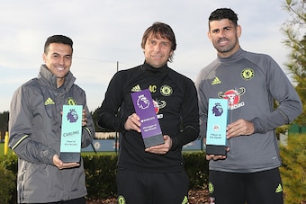 COBHAM, ENGLAND - DECEMBER 09:  Pedro, Manager Antonio Conte and Diego Costa pose with their awards as they receive the Monthly Premier League Awards at Chelsea Training Ground on December 9, 2016 in Cobham, England.  (Photo by Christopher Lee/Getty Image