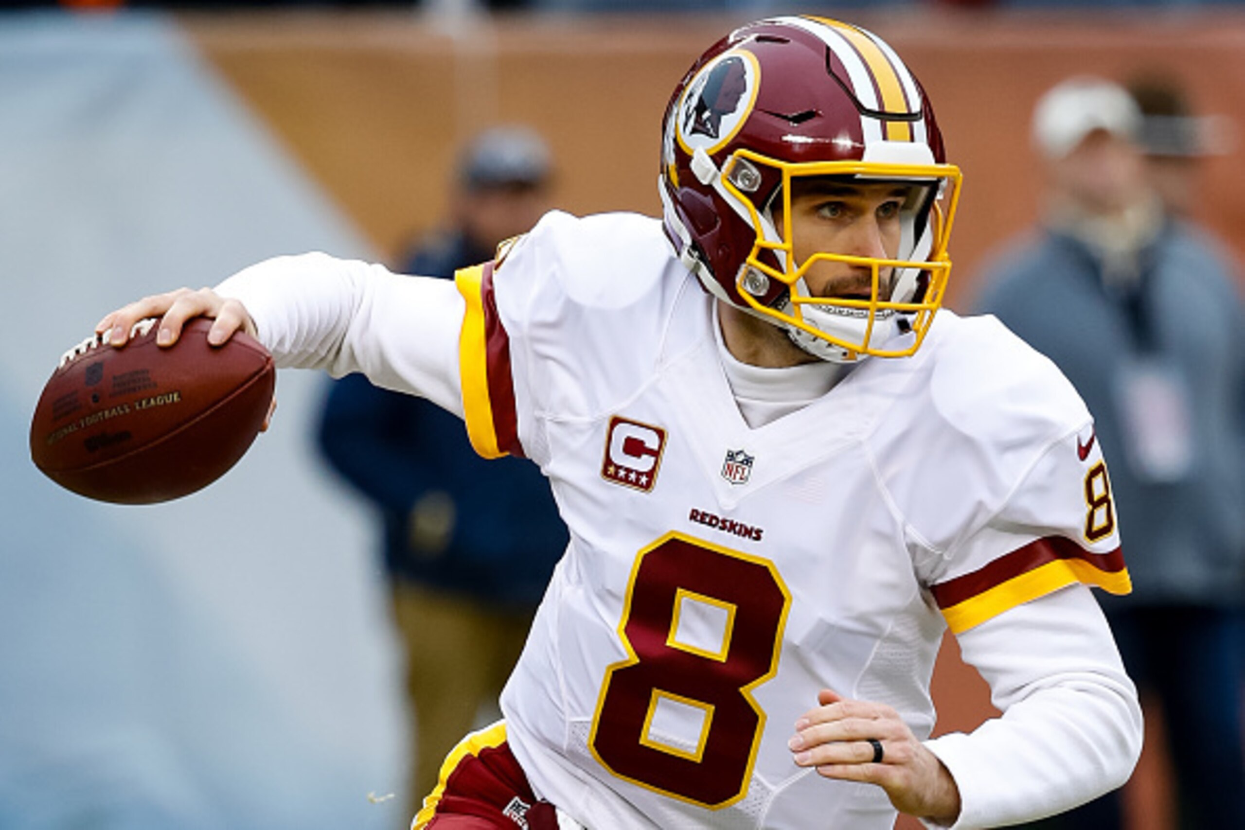 CHICAGO, IL - DECEMBER 24:  Quarterback Kirk Cousins #8 of the Washington Redskins looks to pass the football in the first quarter against the Chicago Bears at Soldier Field on December 24, 2016 in Chicago, Illinois.  (Photo by Joe Robbins/Getty Images)