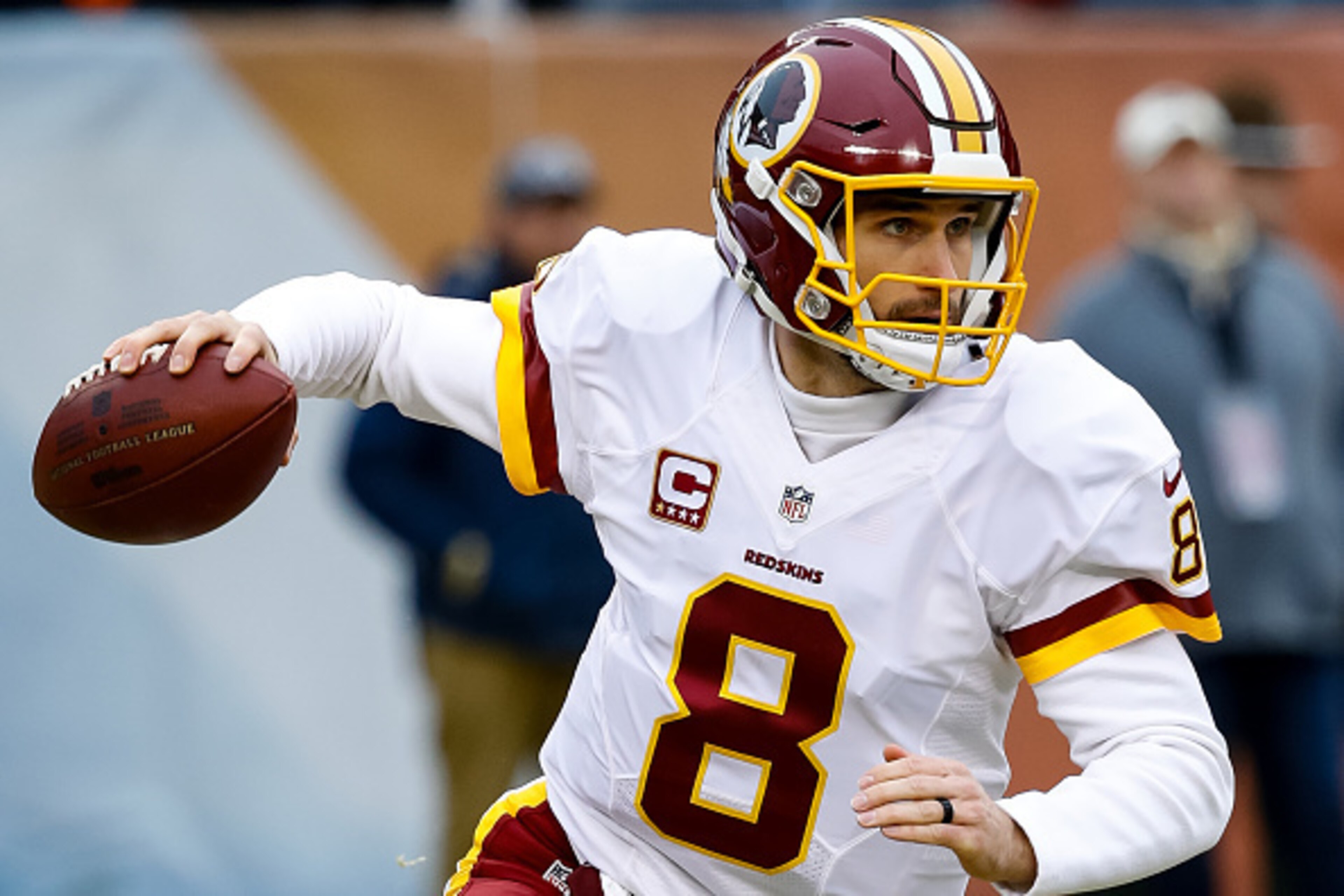 CHICAGO, IL - DECEMBER 24:  Quarterback Kirk Cousins #8 of the Washington Redskins looks to pass the football in the first quarter against the Chicago Bears at Soldier Field on December 24, 2016 in Chicago, Illinois.  (Photo by Joe Robbins/Getty Images)
