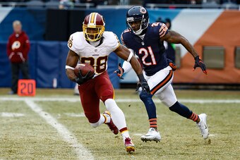 CHICAGO, IL - DECEMBER 24:  Pierre Garcon #88 of the Washington Redskins carries the football against  Tracy Porter #21 of the Chicago Bears in the second quarter at Soldier Field on December 24, 2016 in Chicago, Illinois.  (Photo by Joe Robbins/Getty Ima