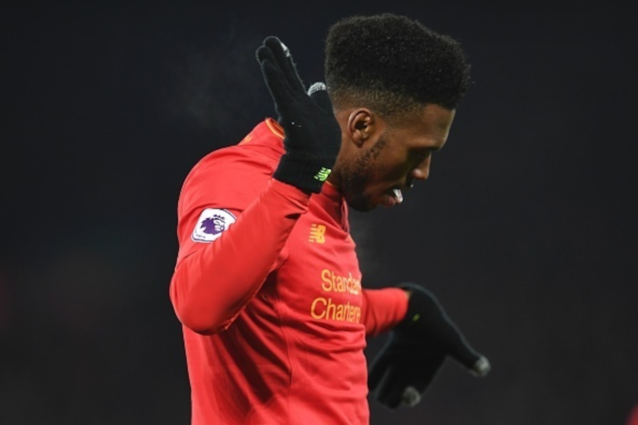 Liverpool's English striker Daniel Sturridge celebrates scoring their fourth goal during the English Premier League football match between Liverpool and Stoke City at Anfield in Liverpool, north west England on December 27, 2016. / AFP / Paul ELLIS / REST Liverpool's English striker Daniel Sturridge celebrates scoring their fourth goal during the English Premier League football match between Liverpool and Stoke City at Anfield in Liverpool, north west England on December 27, 2016. / AFP / Paul ELLIS / REST