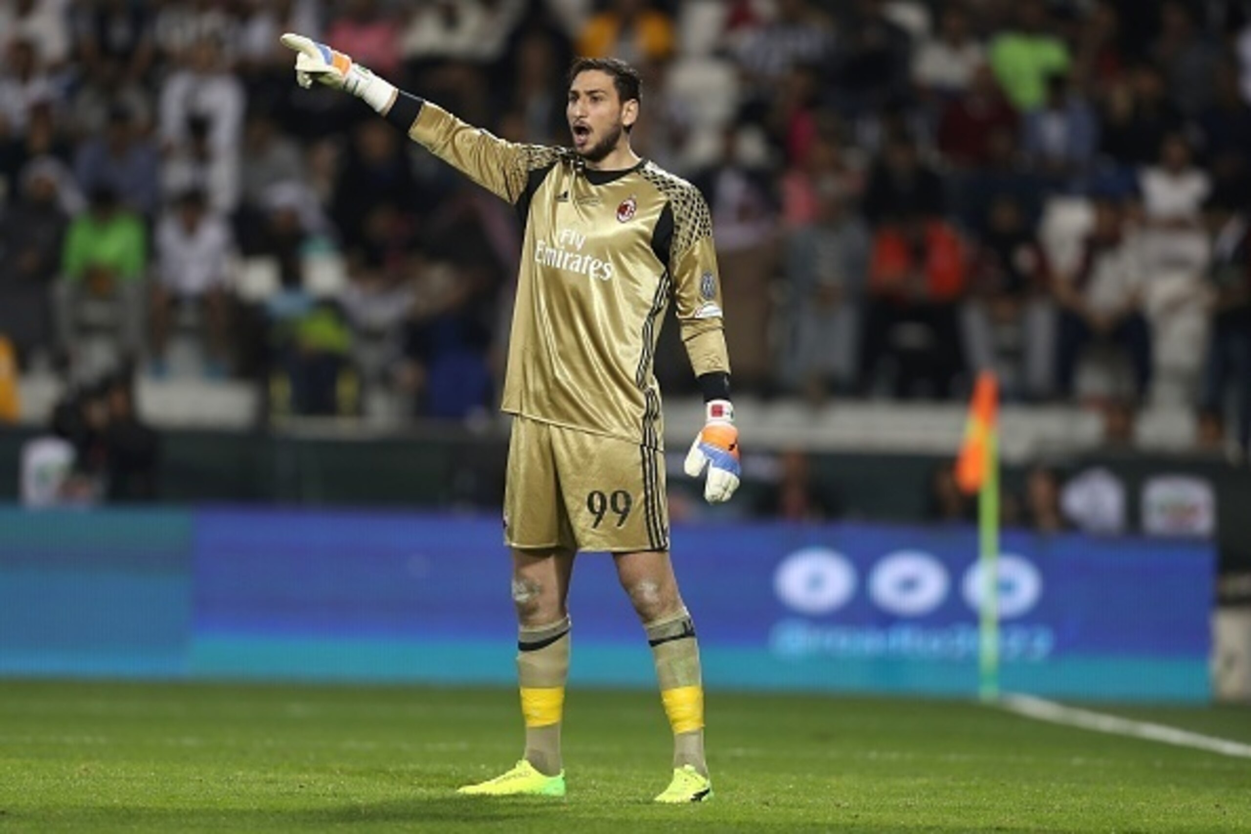 AC Milan's goalkeeper Gianluigi Donnarumma reacts during the Italian Super Cup final match between AC Milan and Juventus in Doha on December 23, 2016. / AFP / KARIM JAAFAR        (Photo credit should read KARIM JAAFAR/AFP/Getty Images)