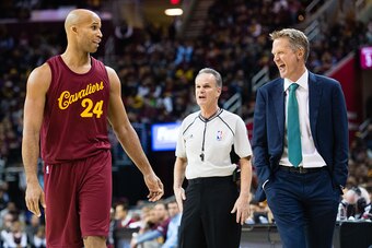 CLEVELAND, OH - DECEMBER 25: Richard Jefferson #24 of the Cleveland Cavaliers jokes with Steve Kerr of the Golden State Warriors during the first half at Quicken Loans Arena on December 25, 2016 in Cleveland, Ohio. NOTE TO USER: User expressly acknowledge