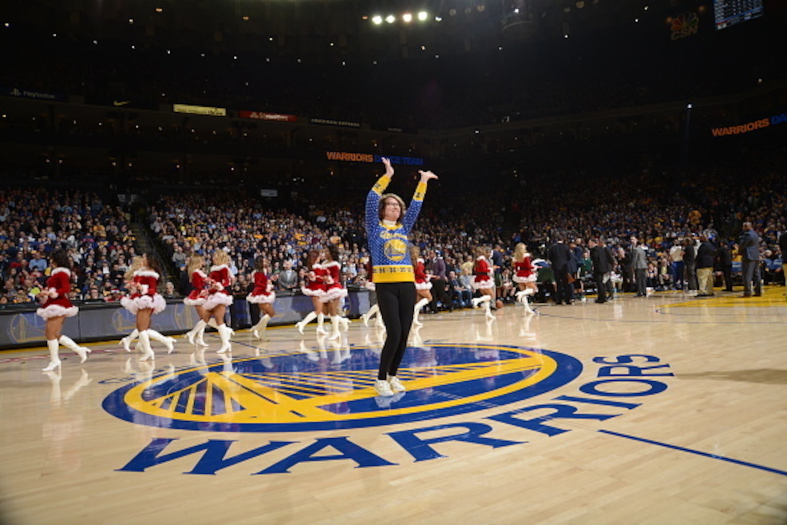 OAKLAND, CA - DECEMBER 20: Dancing Warriors mom Robin Schreiber dances with the Warriors dance team during the game between the Golden State Warriors and Utah Jazz on December 20, 2016 at ORACLE Arena in Oakland, California. NOTE TO USER: User expressly OAKLAND, CA - DECEMBER 20: Dancing Warriors mom Robin Schreiber dances with the Warriors dance team during the game between the Golden State Warriors and Utah Jazz on December 20, 2016 at ORACLE Arena in Oakland, California. NOTE TO USER: User expressly