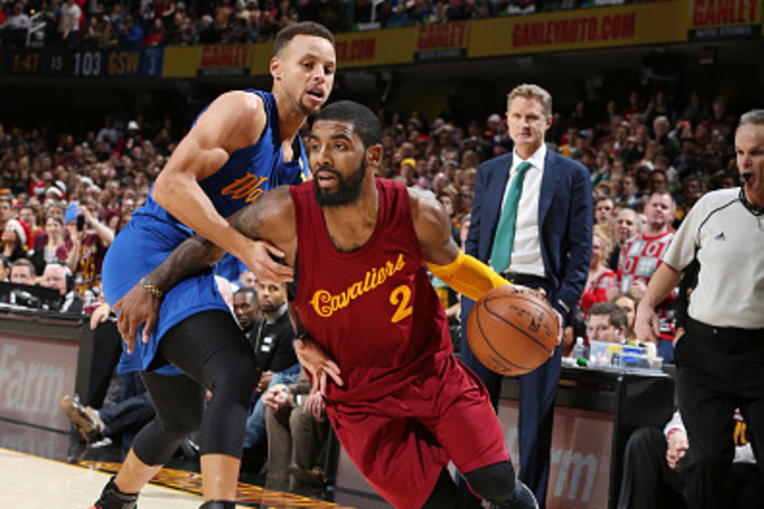 CLEVELAND, OH - DECEMBER 25: Kyrie Irving #2 of the Cleveland Cavaliers drives to the basket against Stephen Curry #30 of the Golden State Warriors during the game on December 25, 2016 at Quicken Loans Arena in Cleveland, Ohio. NOTE TO USER: User express CLEVELAND, OH - DECEMBER 25: Kyrie Irving #2 of the Cleveland Cavaliers drives to the basket against Stephen Curry #30 of the Golden State Warriors during the game on December 25, 2016 at Quicken Loans Arena in Cleveland, Ohio. NOTE TO USER: User express