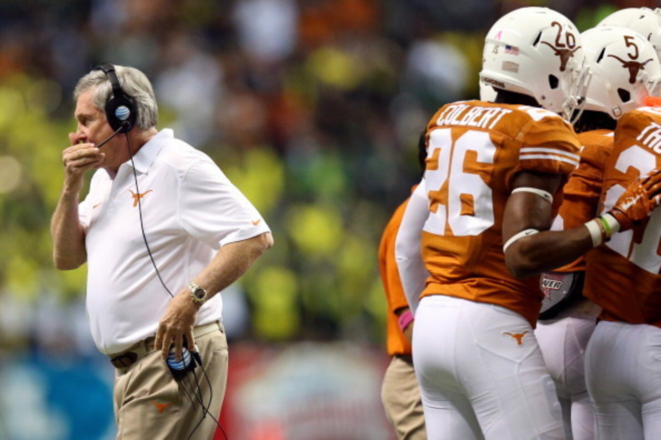 SAN ANTONIO, TX - DECEMBER 30:  Head coach Mack Brown of the Texas Longhorns looks on against the Oregon Ducks during the Valero Alamo Bowl at the Alamodome on December 30, 2013 in San Antonio, Texas.  (Photo by Ronald Martinez/Getty Images)