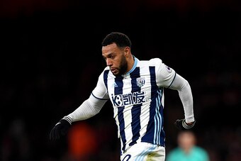 LONDON, ENGLAND - DECEMBER 26:  Matt Phillips of West Bromwich Albion battles for the ball with Hector Bellerin of Arsenal during the Premier League match between Arsenal and West Bromwich Albion at Emirates Stadium on December 26, 2016 in London, England