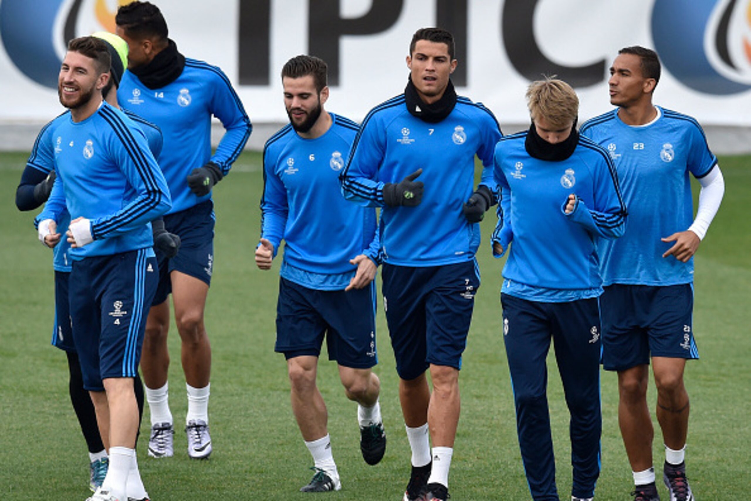 (FromL) Real Madrid's defender Sergio Ramos, Real Madrid's defender Nacho Fernandez, Real Madrid's Portuguese forward Cristiano Ronaldo, Real Madrid's Norwegian midfielder Martin Odegaard and Real Madrid's Brazilian defender Danilo jog during a training s