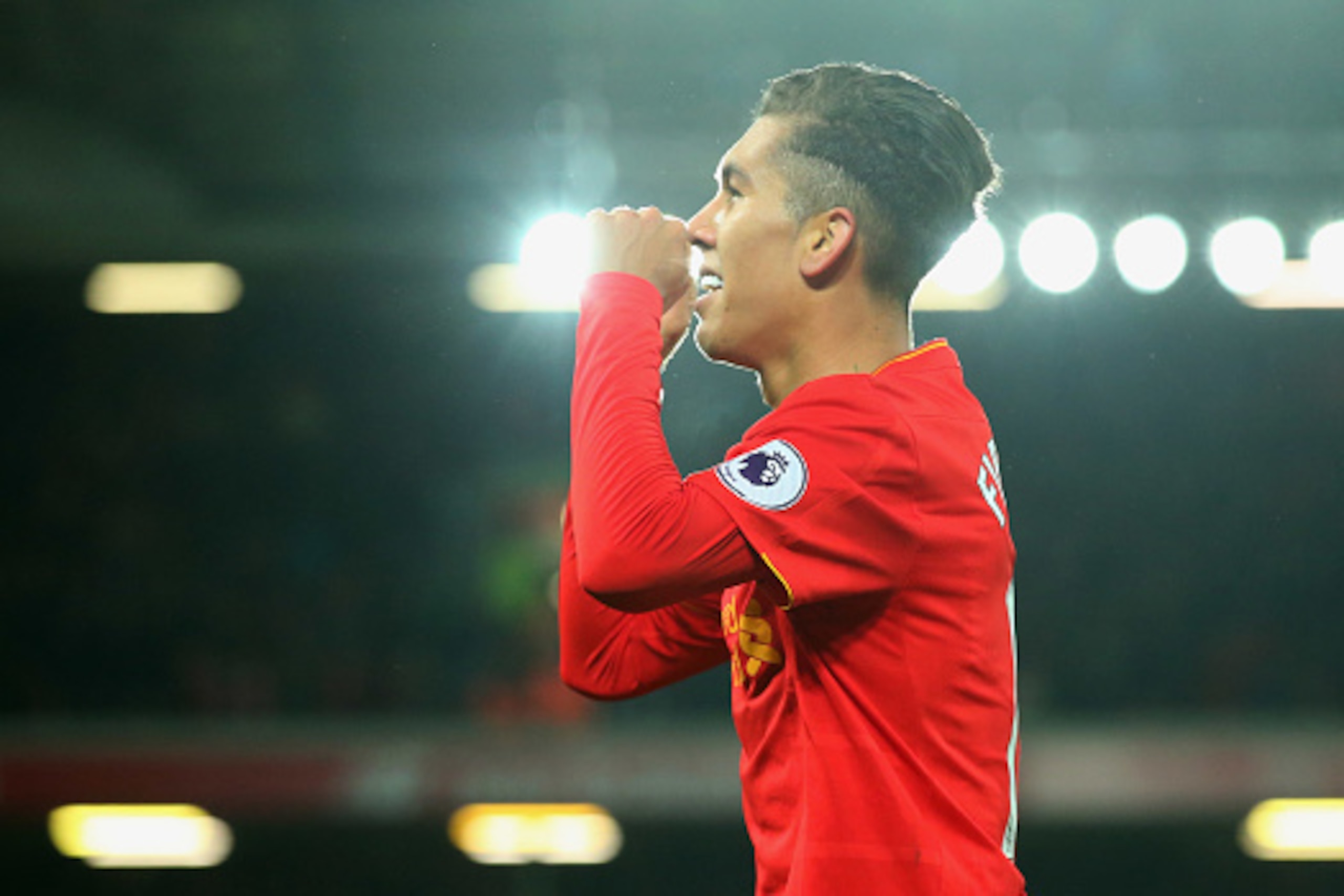 LIVERPOOL, ENGLAND - DECEMBER 27:  Roberto Firmino of Liverpool celebrates as he scores their second goal during the Premier League match between Liverpool and Stoke City at Anfield on December 27, 2016 in Liverpool, England.  (Photo by Alex Livesey/Getty