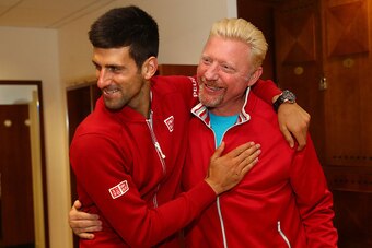 PARIS, FRANCE - JUNE 05:  Champion Novak Djokovic of Serbia clebrates with his coach, Boris Becker following his victory during the Men's Singles final match against Andy Murray of Great Britain on day fifteen of the 2016 French Open at Roland Garros on J