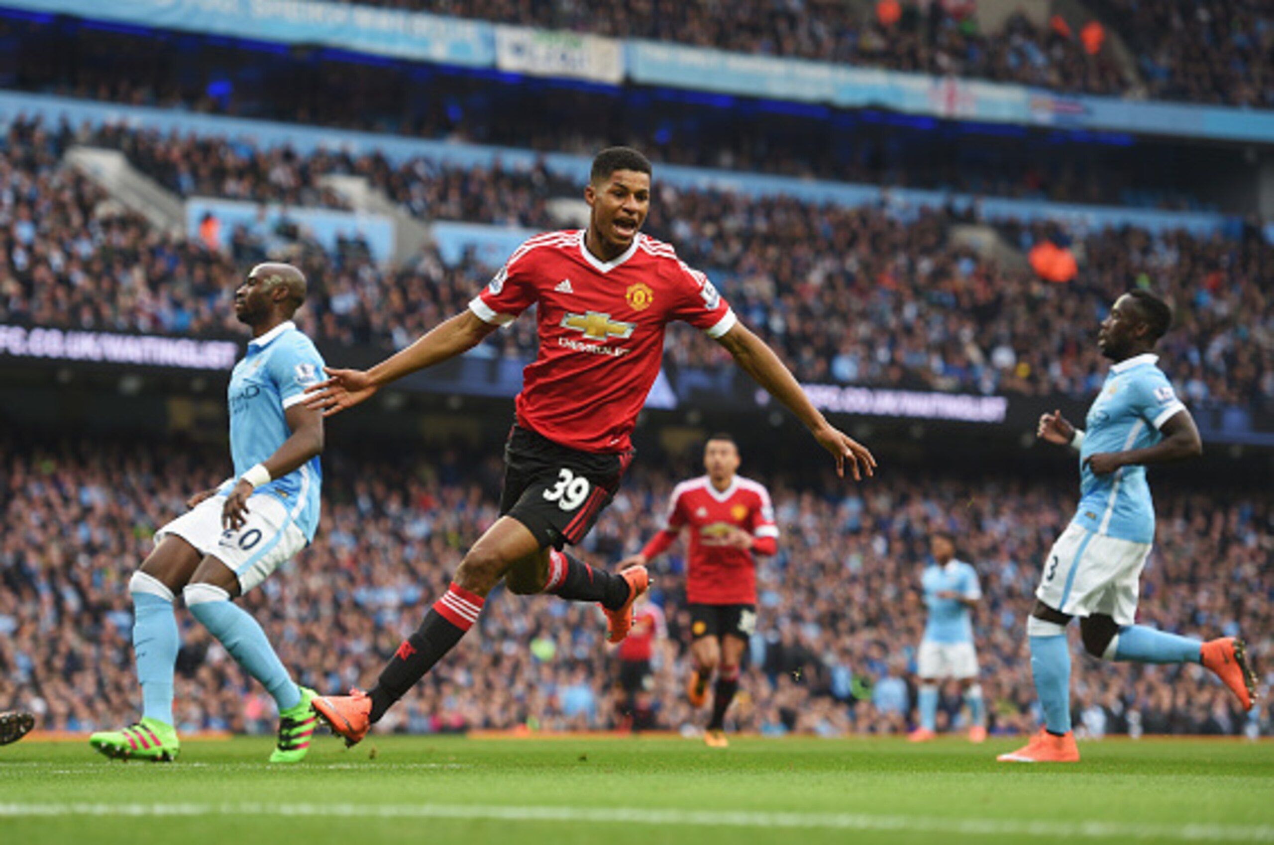 MANCHESTER, ENGLAND - MARCH 20:  Marcus Rashford of Manchester United celebrates as he scores their first goal during the Barclays Premier League match between Manchester City and Manchester United at Etihad Stadium on March 20, 2016 in Manchester, United