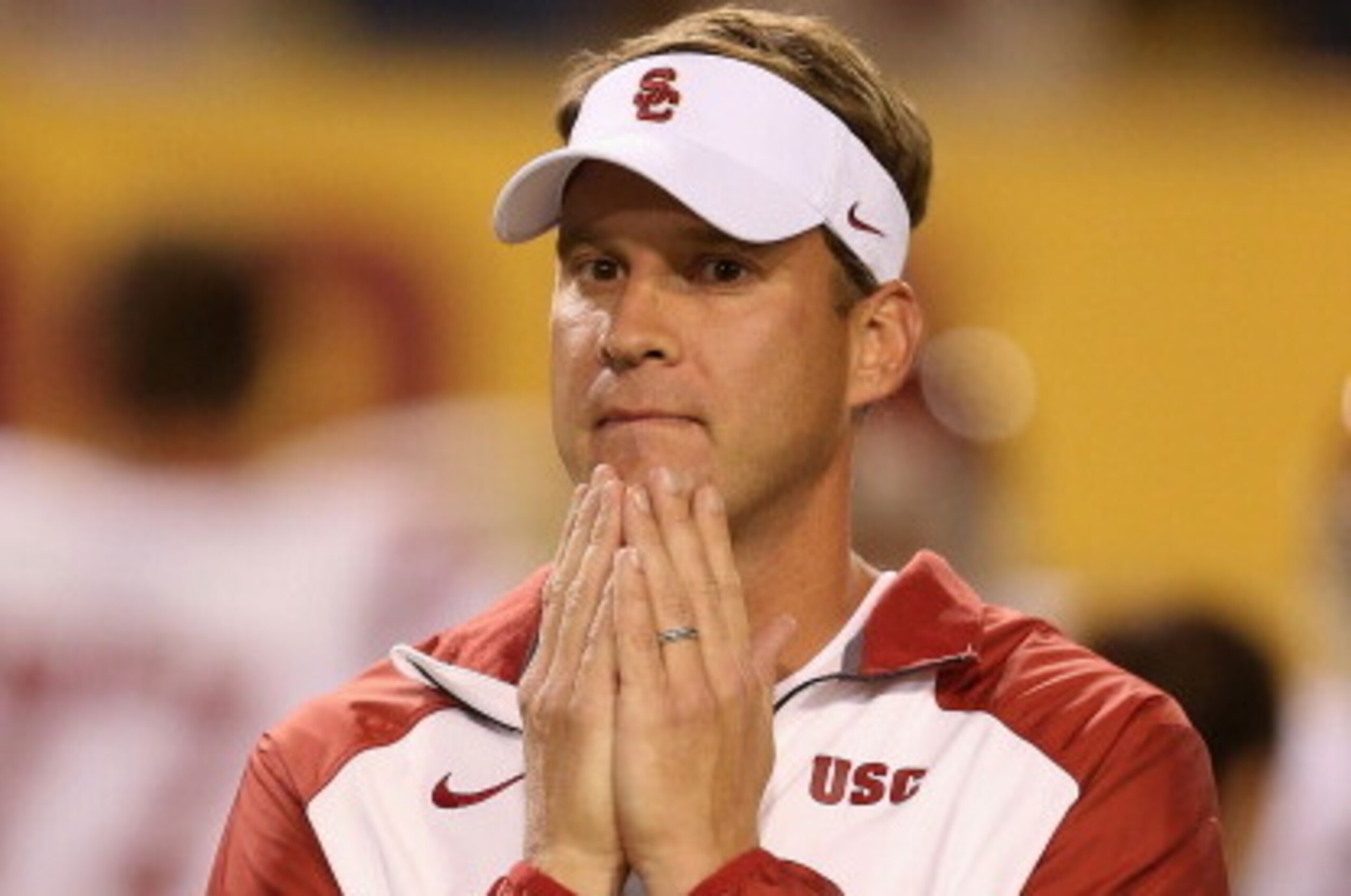TEMPE, AZ - SEPTEMBER 28:  Head coach Lane Kiffin  of the USC Trojans reacts during the college football game against the Arizona State Sun Devils at Sun Devil Stadium on September 28, 2013 in Tempe, Arizona.  The Sun Devils defeated the Trojans 62-41.  (