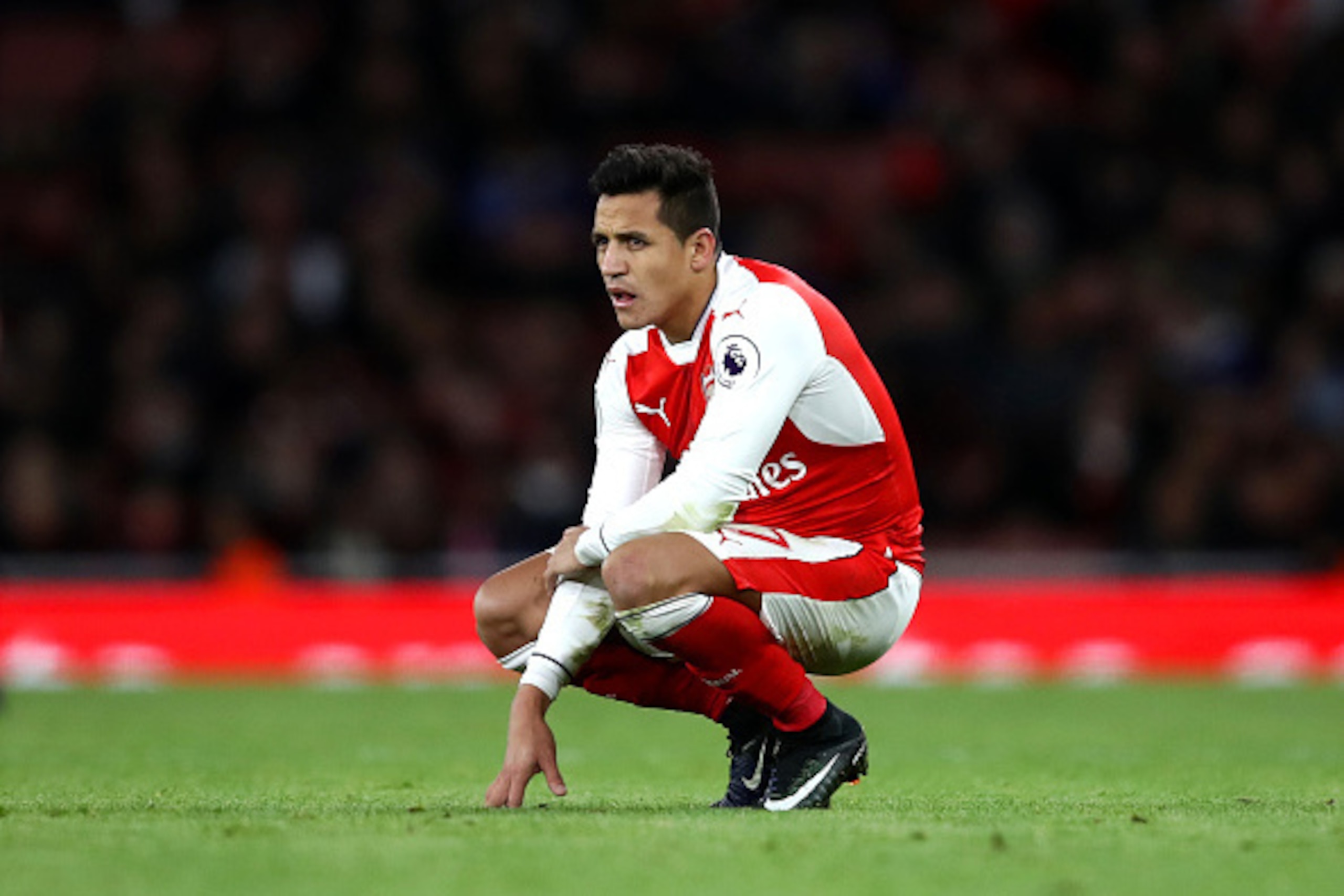 LONDON, ENGLAND - DECEMBER 26:  Alexis Sanchez of Arsenal reacts during the Premier League match between Arsenal and West Bromwich Albion at Emirates Stadium on December 26, 2016 in London, England.  (Photo by Julian Finney/Getty Images)