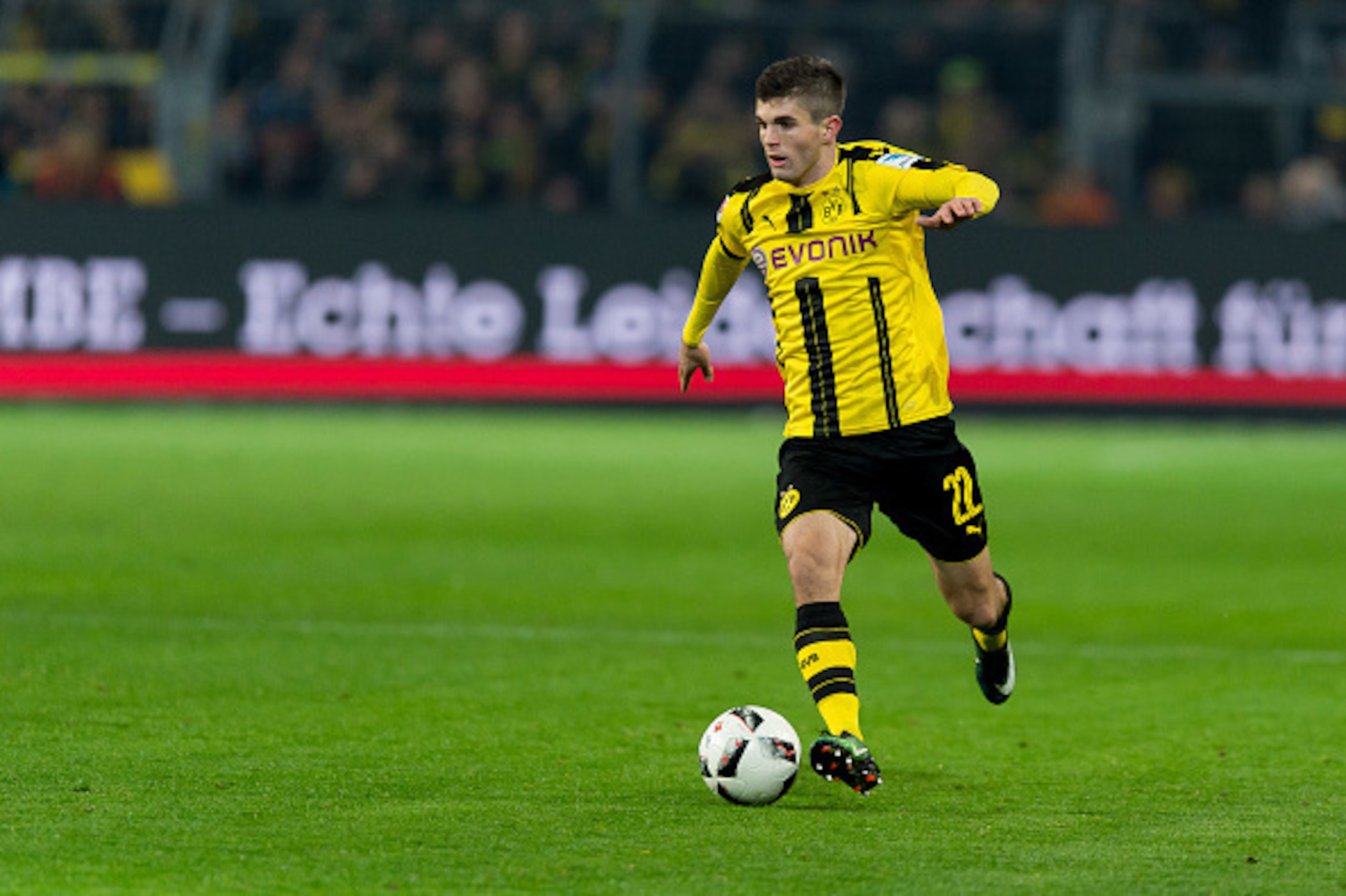 DORTMUND, GERMANY - DECEMBER 20: Christian Pulisic of Dortmund in action during the Bundesliga match between Borussia Dortmund and FC Augsburg at Signal Iduna Park on December 20, 2016 in Dortmund, Germany. (Photo by TF-Images/Getty Images) DORTMUND, GERMANY - DECEMBER 20: Christian Pulisic of Dortmund in action during the Bundesliga match between Borussia Dortmund and FC Augsburg at Signal Iduna Park on December 20, 2016 in Dortmund, Germany. (Photo by TF-Images/Getty Images)