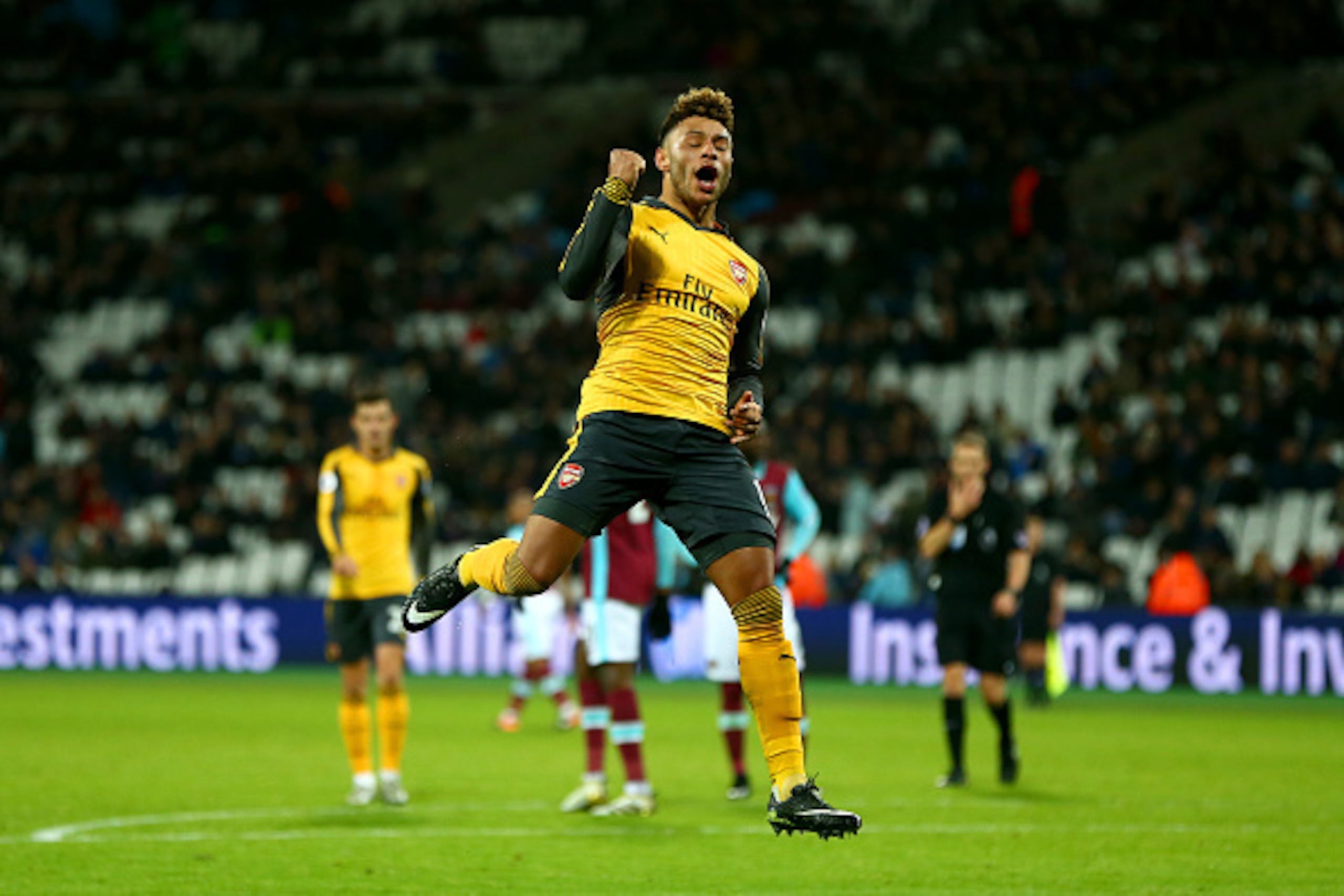 LONDON, ENGLAND - DECEMBER 03: Alex Oxlade-Chamberlain of Arsenal celebrates after scoring his team's fourth goal during the Premier League match between West Ham United and Arsenal at London Stadium on December 3, 2016 in London, England. (Photo by Jor LONDON, ENGLAND - DECEMBER 03: Alex Oxlade-Chamberlain of Arsenal celebrates after scoring his team's fourth goal during the Premier League match between West Ham United and Arsenal at London Stadium on December 3, 2016 in London, England. (Photo by Jor
