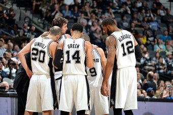 SAN ANTONIO, TX - DECEMBER 28: The San Antonio Spurs huddle up during the game against the Phoenix Suns on December 28, 2016 at the AT&T Center in San Antonio, Texas. NOTE TO USER: User expressly acknowledges and agrees that, by downloading and or using t