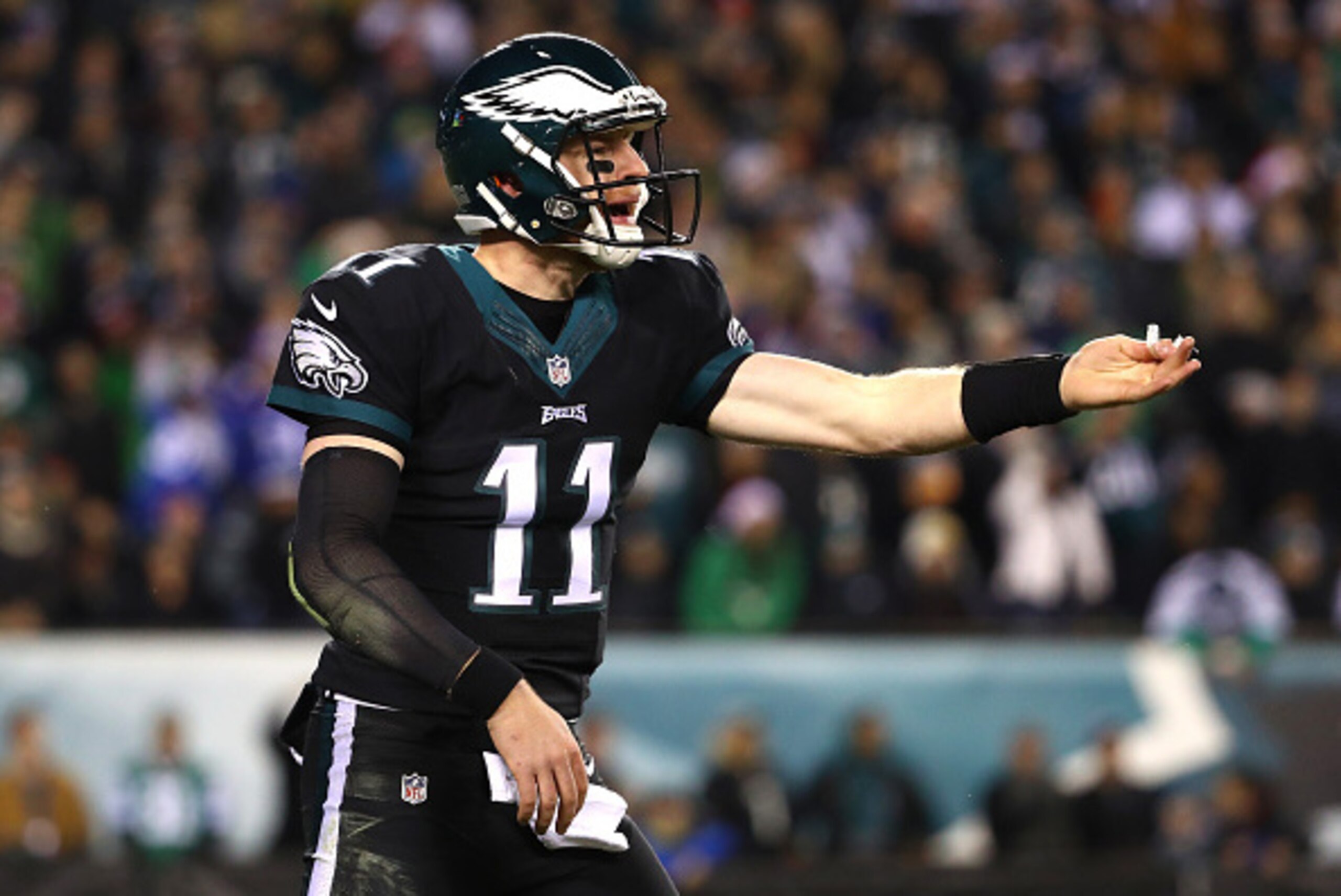 PHILADELPHIA, PA - DECEMBER 22:  Quarterback Carson Wentz #11 of the Philadelphia Eagles reacts against the New York Giants during the second quarter of the game at Lincoln Financial Field on December 22, 2016 in Philadelphia, Pennsylvania.  (Photo by Al 