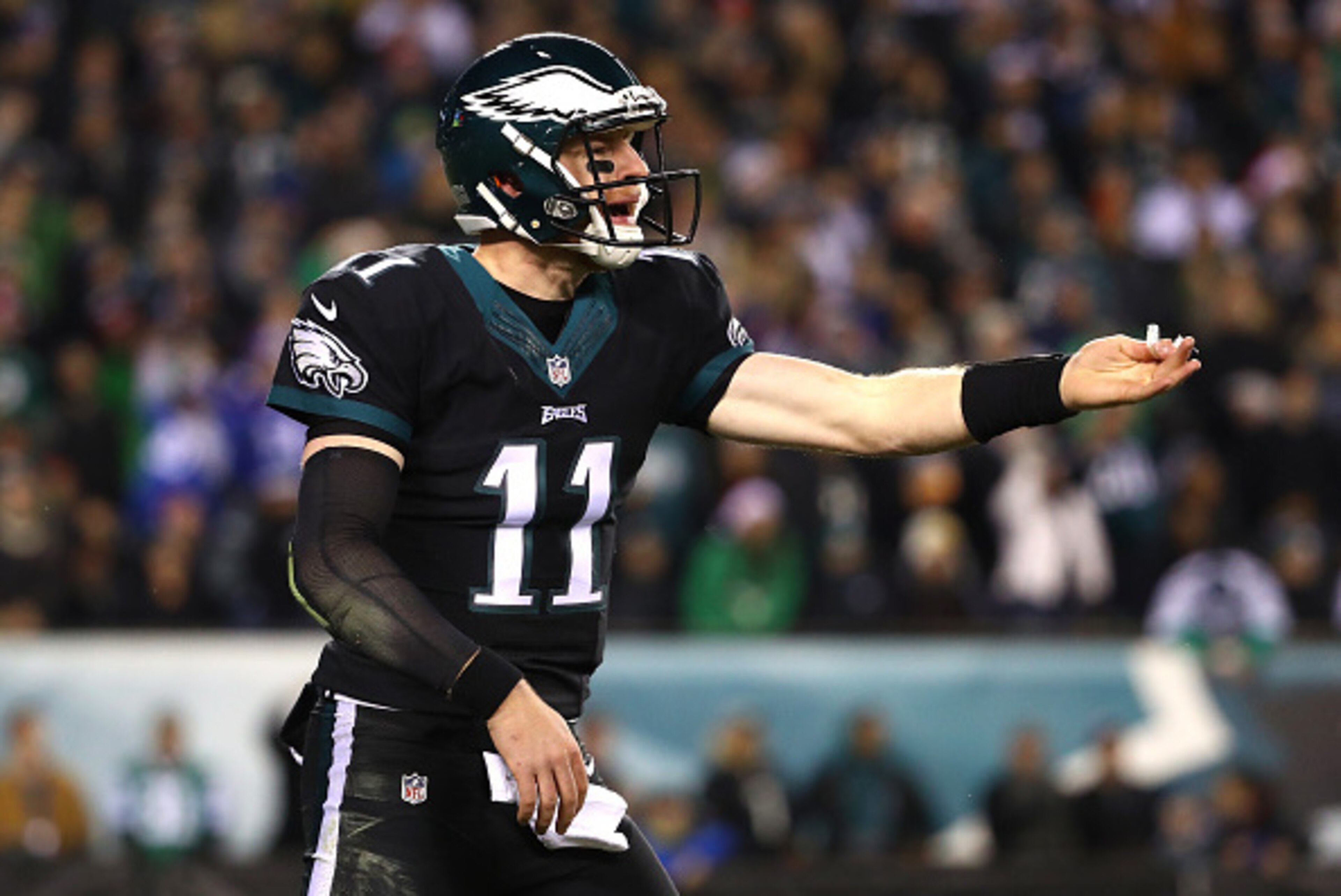 PHILADELPHIA, PA - DECEMBER 22:  Quarterback Carson Wentz #11 of the Philadelphia Eagles reacts against the New York Giants during the second quarter of the game at Lincoln Financial Field on December 22, 2016 in Philadelphia, Pennsylvania.  (Photo by Al 