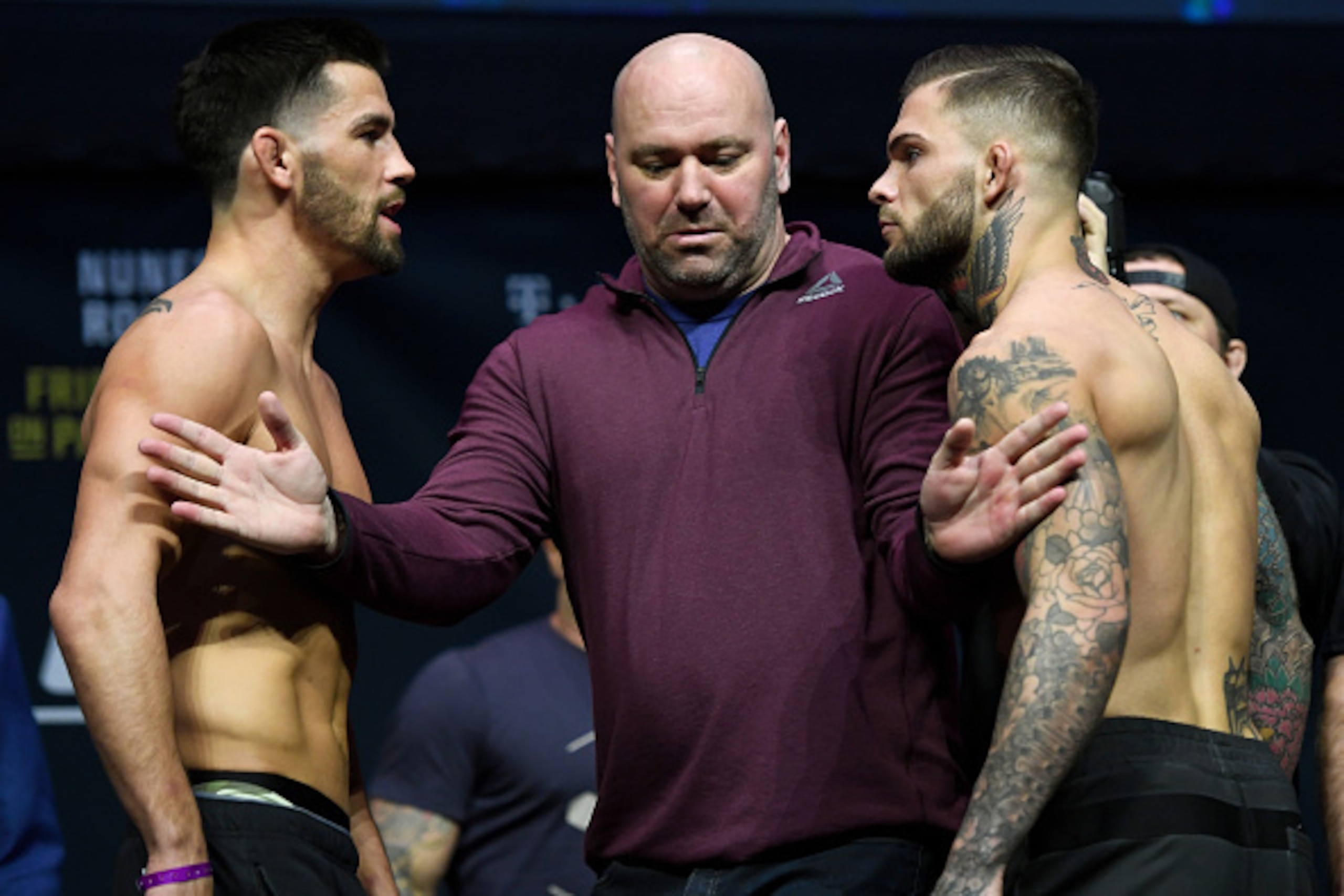LAS VEGAS, NV - DECEMBER 29:  (L-R) UFC bantamweight champion Dominick Cruz and Cody Garbrandt face off during the UFC 207 weigh-in at T-Mobile Arena on December 29, 2016 in Las Vegas, Nevada. (Photo by Josh Hedges/Zuffa LLC/Zuffa LLC via Getty Images)