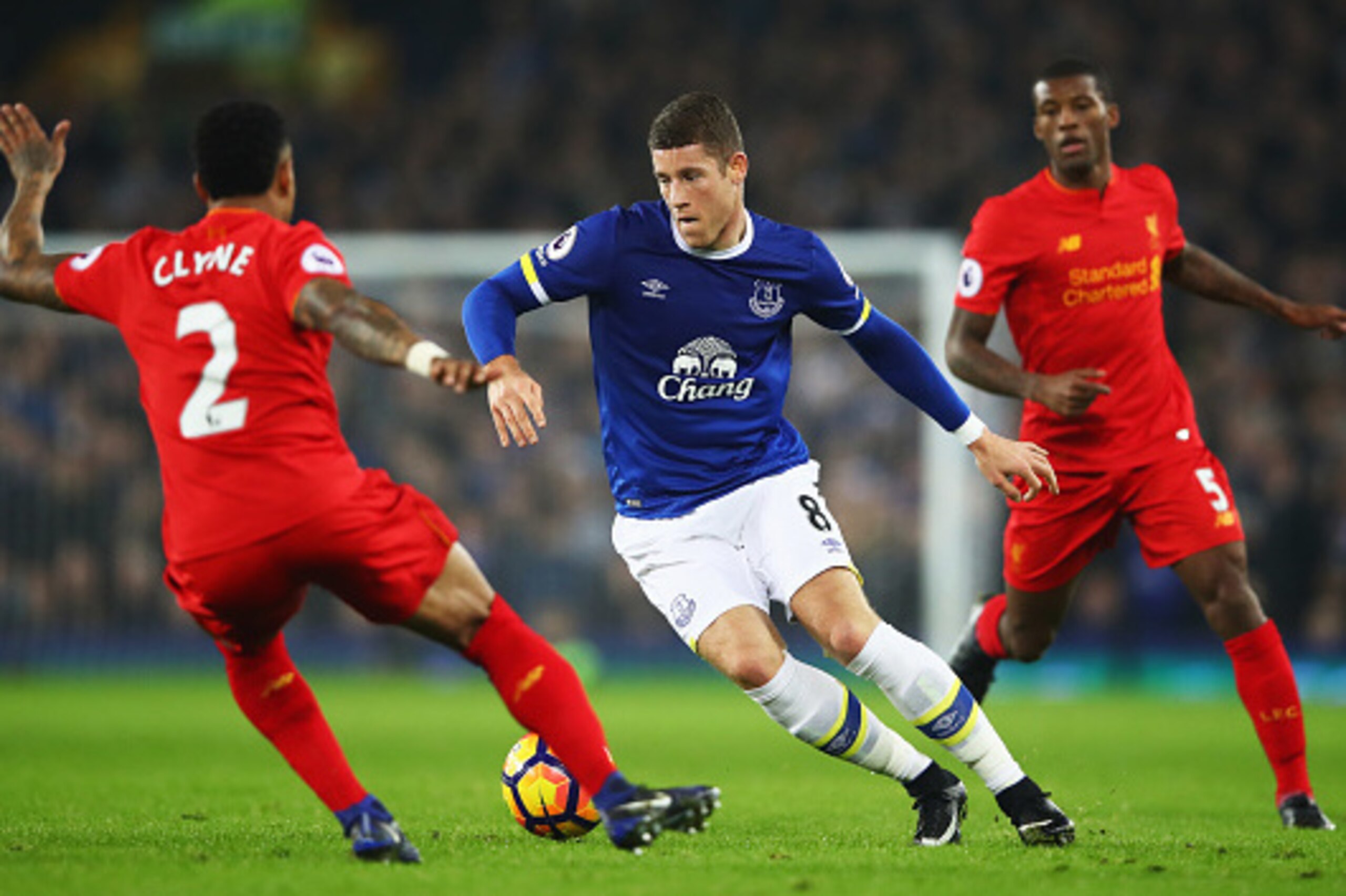 LIVERPOOL, ENGLAND - DECEMBER 19:  Ross Barkley of Everton takes on Nathaniel Clyne of Liverpool (2) during the Premier League match between Everton and Liverpool at Goodison Park on December 19, 2016 in Liverpool, England.  (Photo by Clive Brunskill/Gett